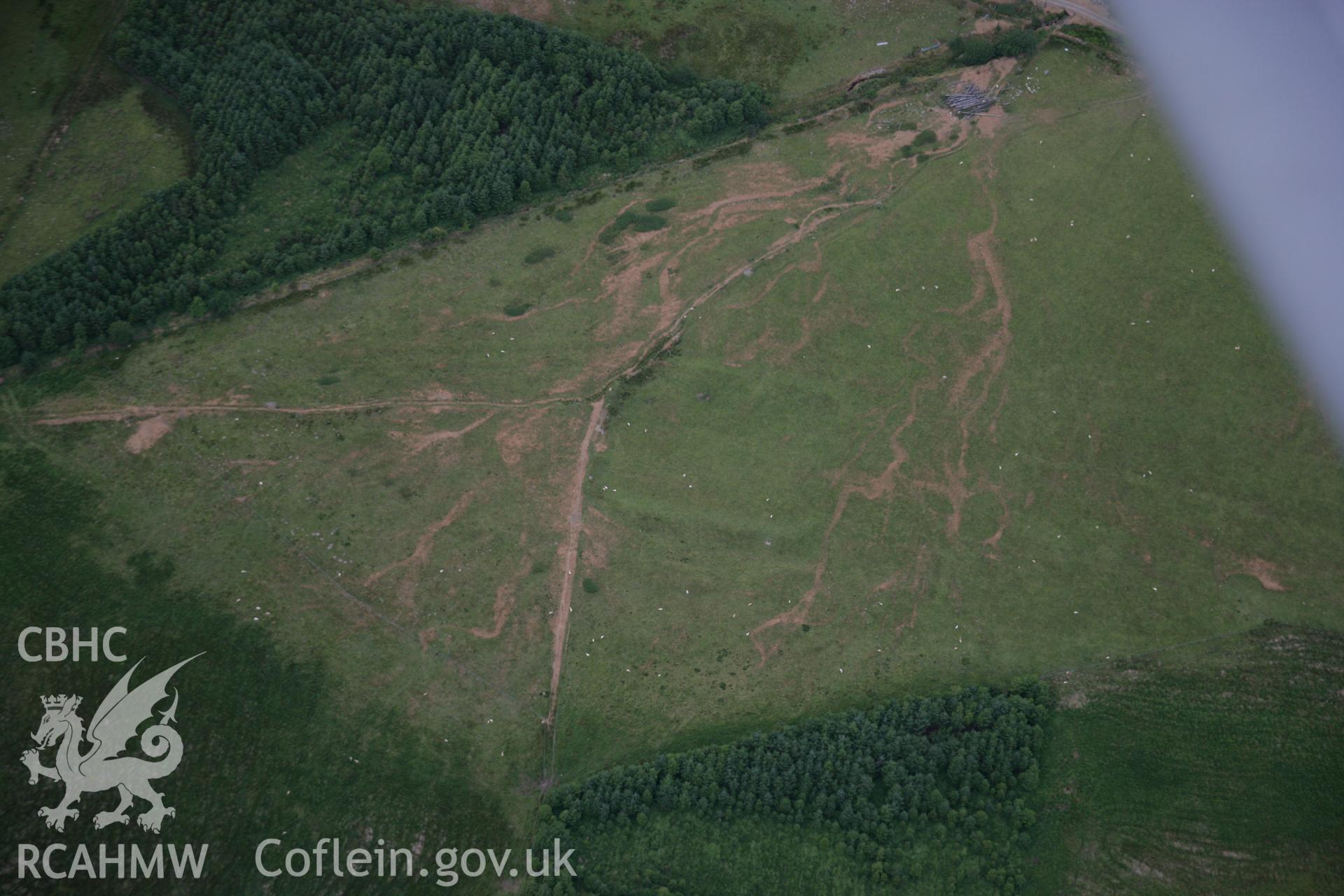 RCAHMW colour oblique aerial photograph of Llys Arthur enclosure. Taken on 27 July 2006 by Toby Driver.