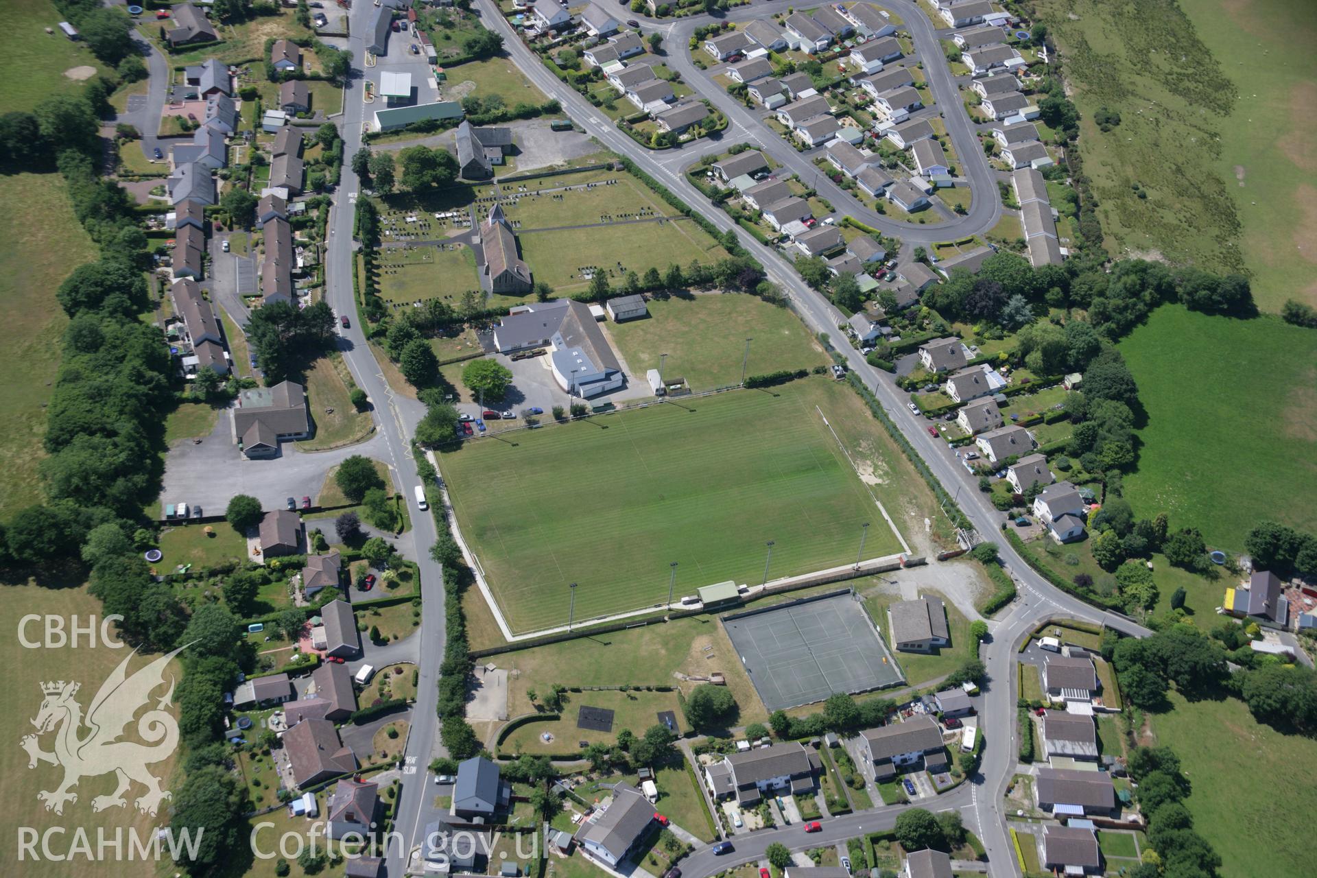 RCAHMW colour oblique aerial photograph of Penrhyncoch Village. Taken on 17 July 2006 by Toby Driver.