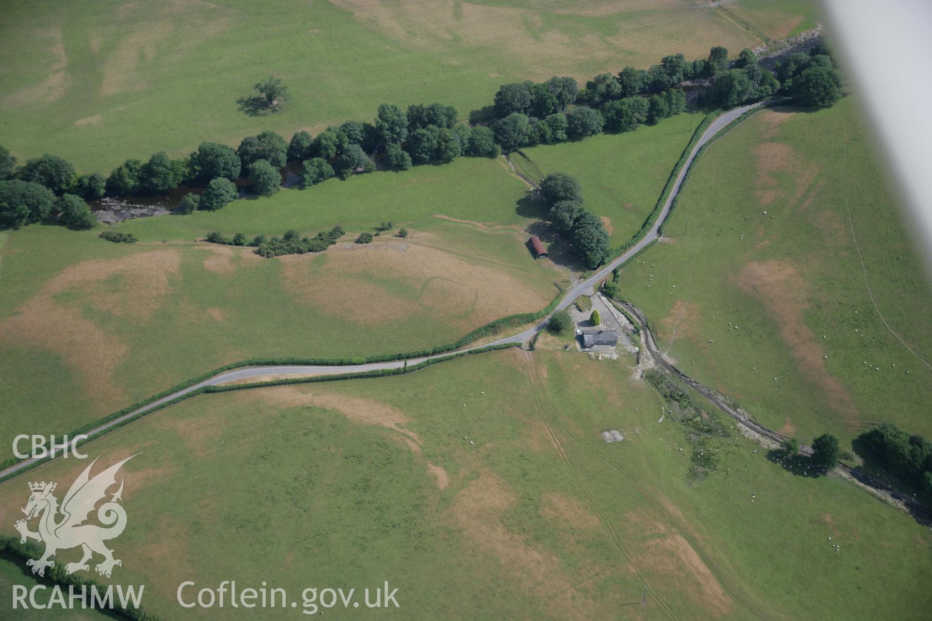 RCAHMW colour oblique aerial photograph of the Roman fortlet at Hafan. Taken on 25 July 2006 by Toby Driver.