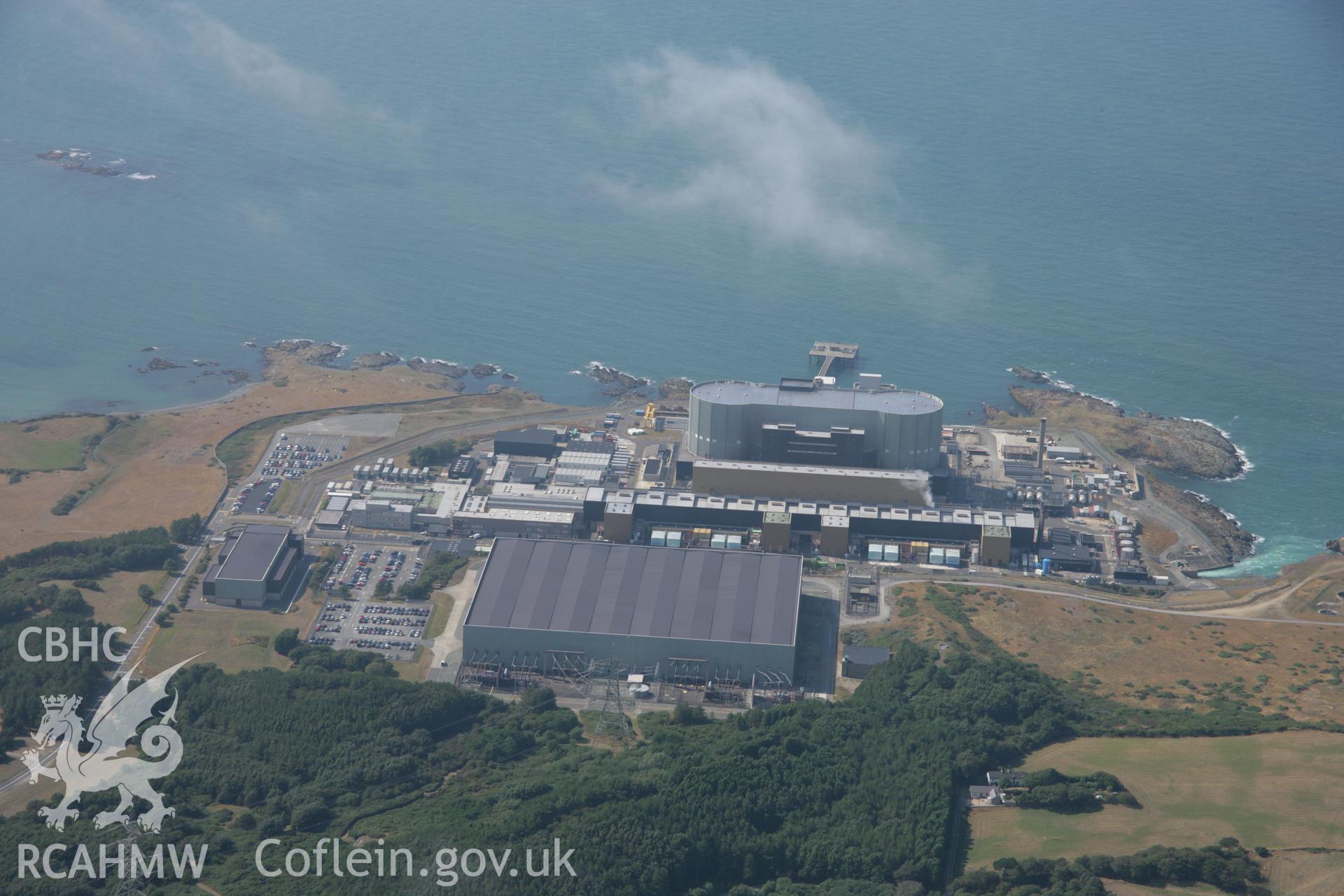RCAHMW colour oblique aerial photograph of Wylfa Nuclear Power Station. Taken on 14 August 2006 by Toby Driver.