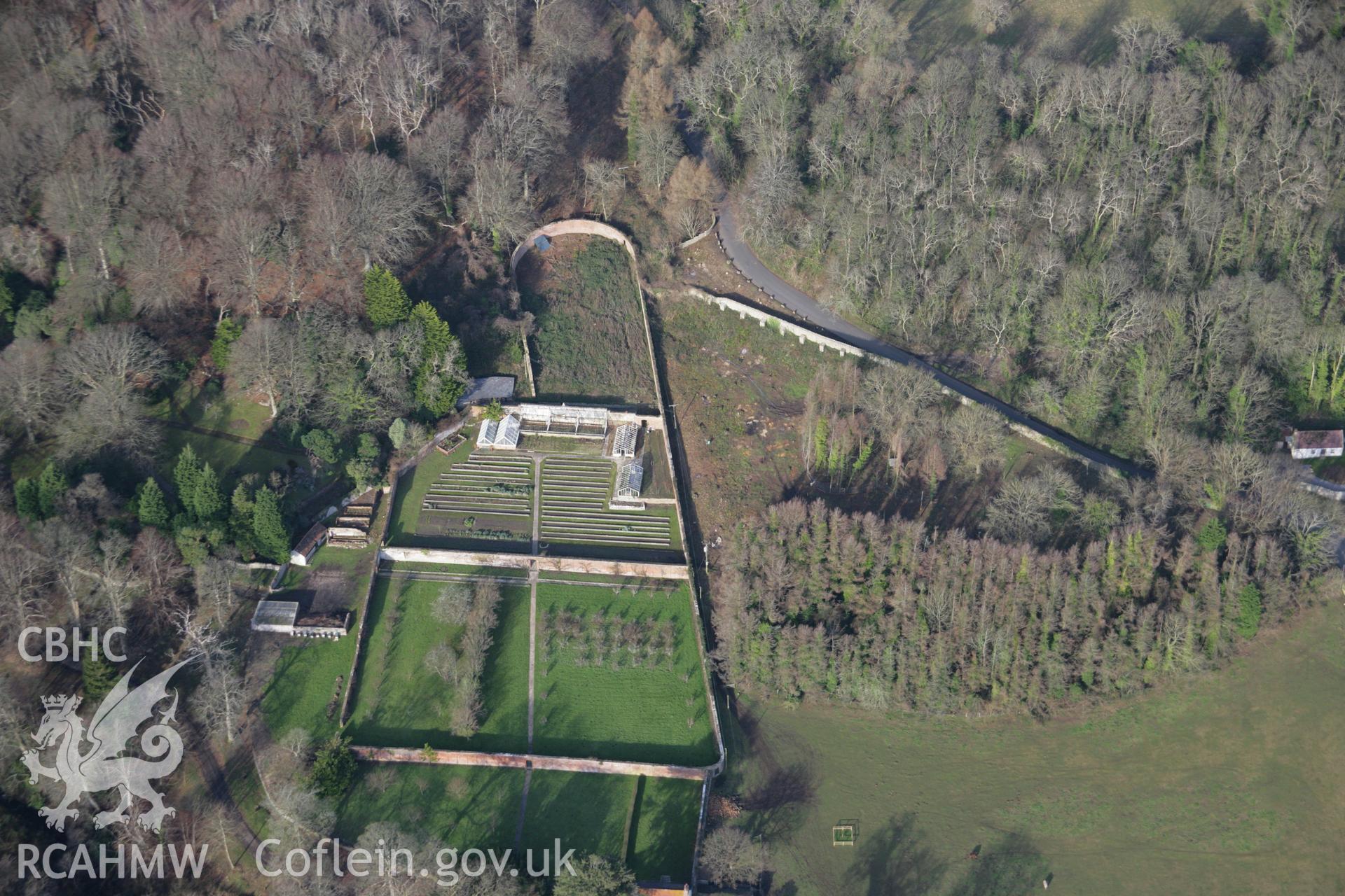 RCAHMW colour oblique aerial photograph of 'Garden House' Walled Garden on the Penrice Estate, from the south. Taken on 26 January 2006 by Toby Driver.
