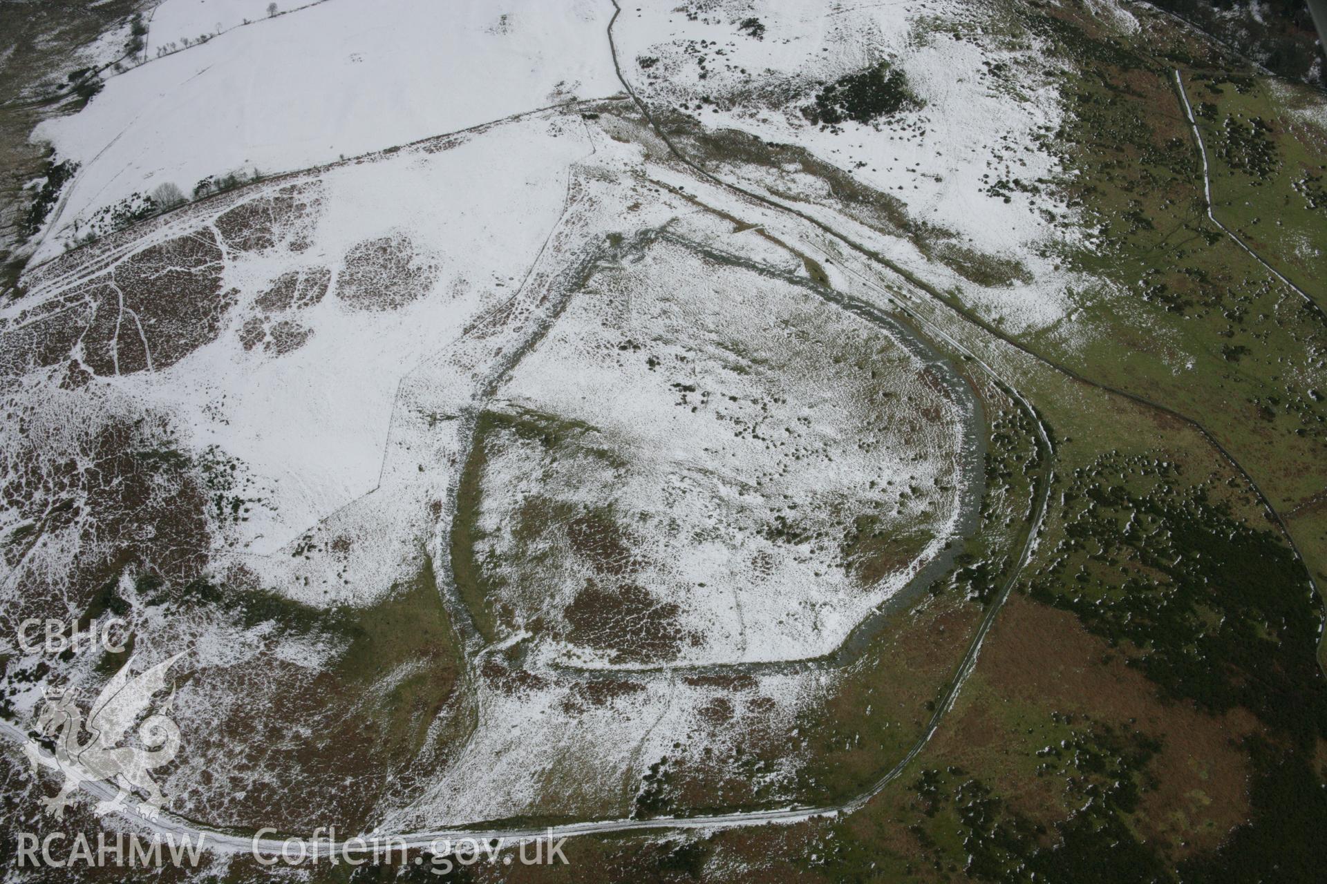 RCAHMW colour oblique aerial photograph of Caer Drewynfrom the west. Taken on 06 March 2006 by Toby Driver.