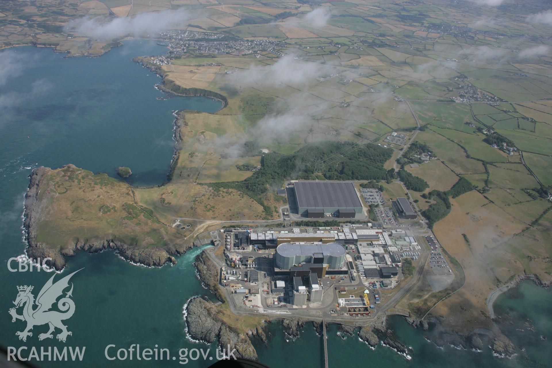 RCAHMW colour oblique aerial photograph of Wylfa Nuclear Power Station. Taken on 14 August 2006 by Toby Driver.