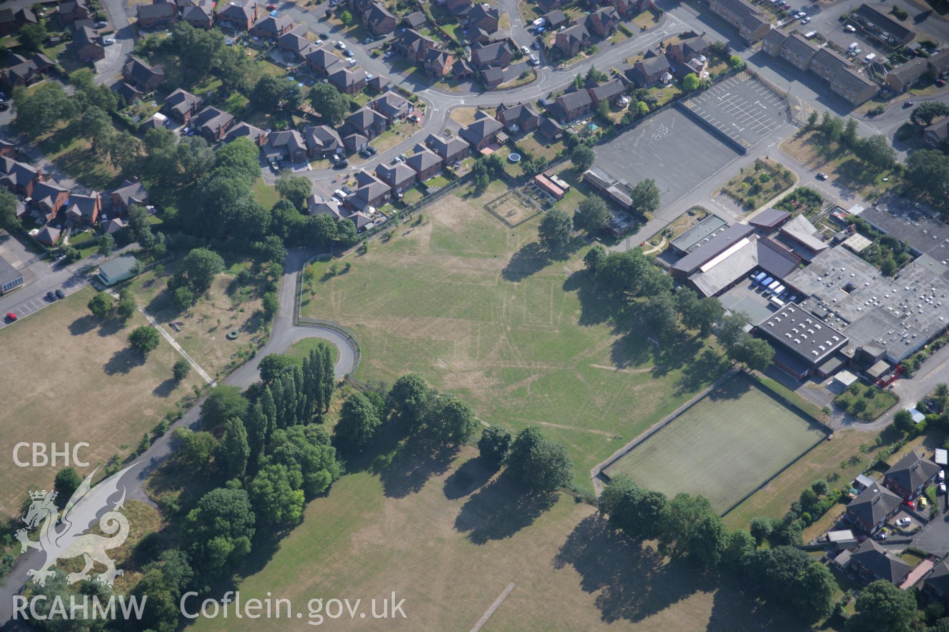 RCAHMW colour oblique aerial photograph of cropmarks of Former Barracks at Hightown. Taken on 17 July 2006 by Toby Driver.