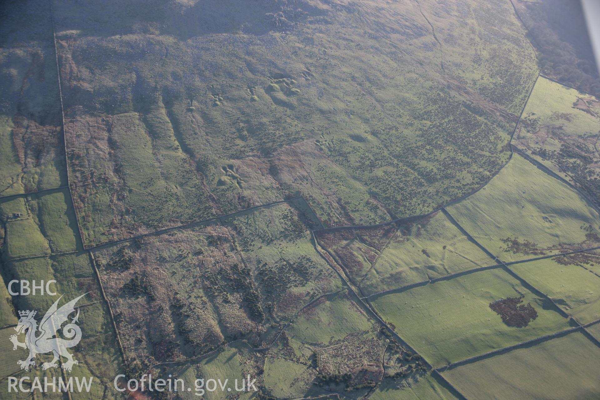 RCAHMW colour oblique aerial photograph of Bwlch Mawr mine workings from the north. Taken on 09 February 2006 by Toby Driver.