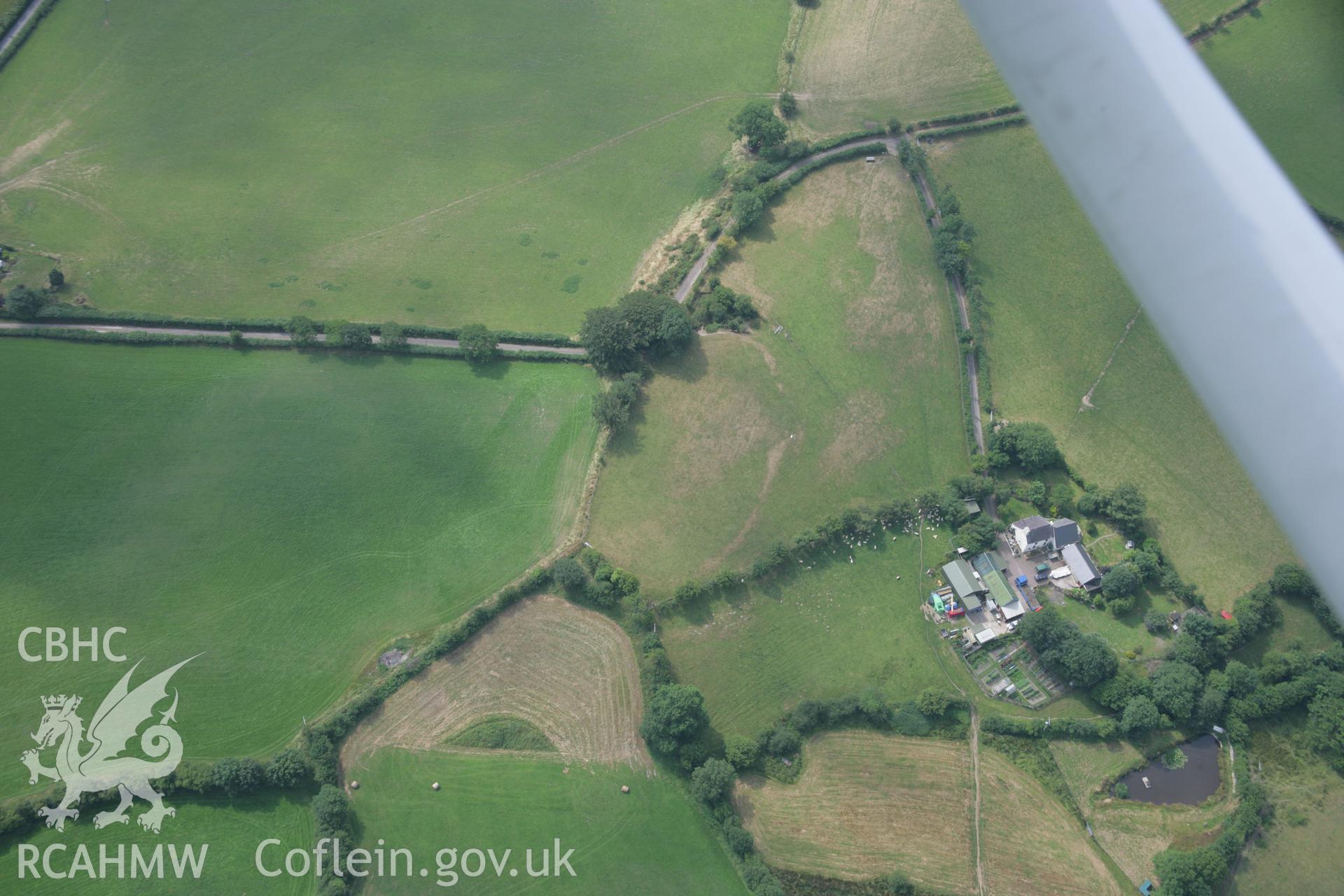 RCAHMW colour oblique aerial photograph of Pen-y-Gaer, Deri-Odwyn. Taken on 21 July 2006 by Toby Driver.