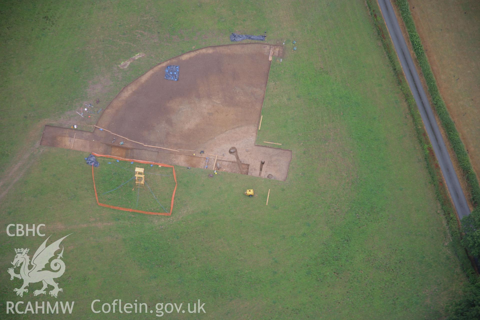 RCAHMW colour oblique aerial photograph of Dyffryn Lane Henge during excavation. Taken on 31 July 2006 by Toby Driver.