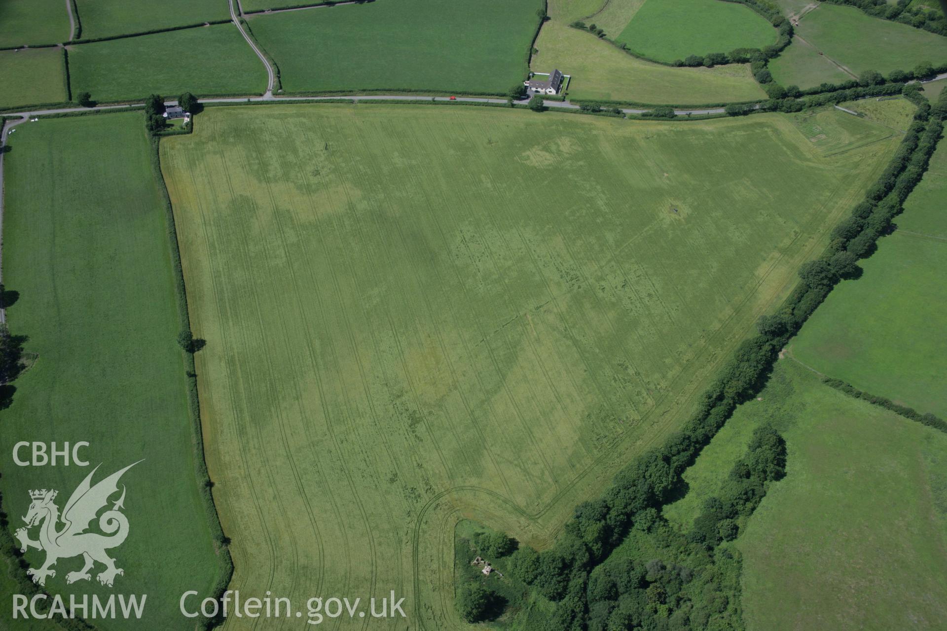 RCAHMW colour oblique aerial photograph of the Roman road west of Carmarthen at Broadway with the road showing as a cropmark. Taken on 11 July 2006 by Toby Driver.