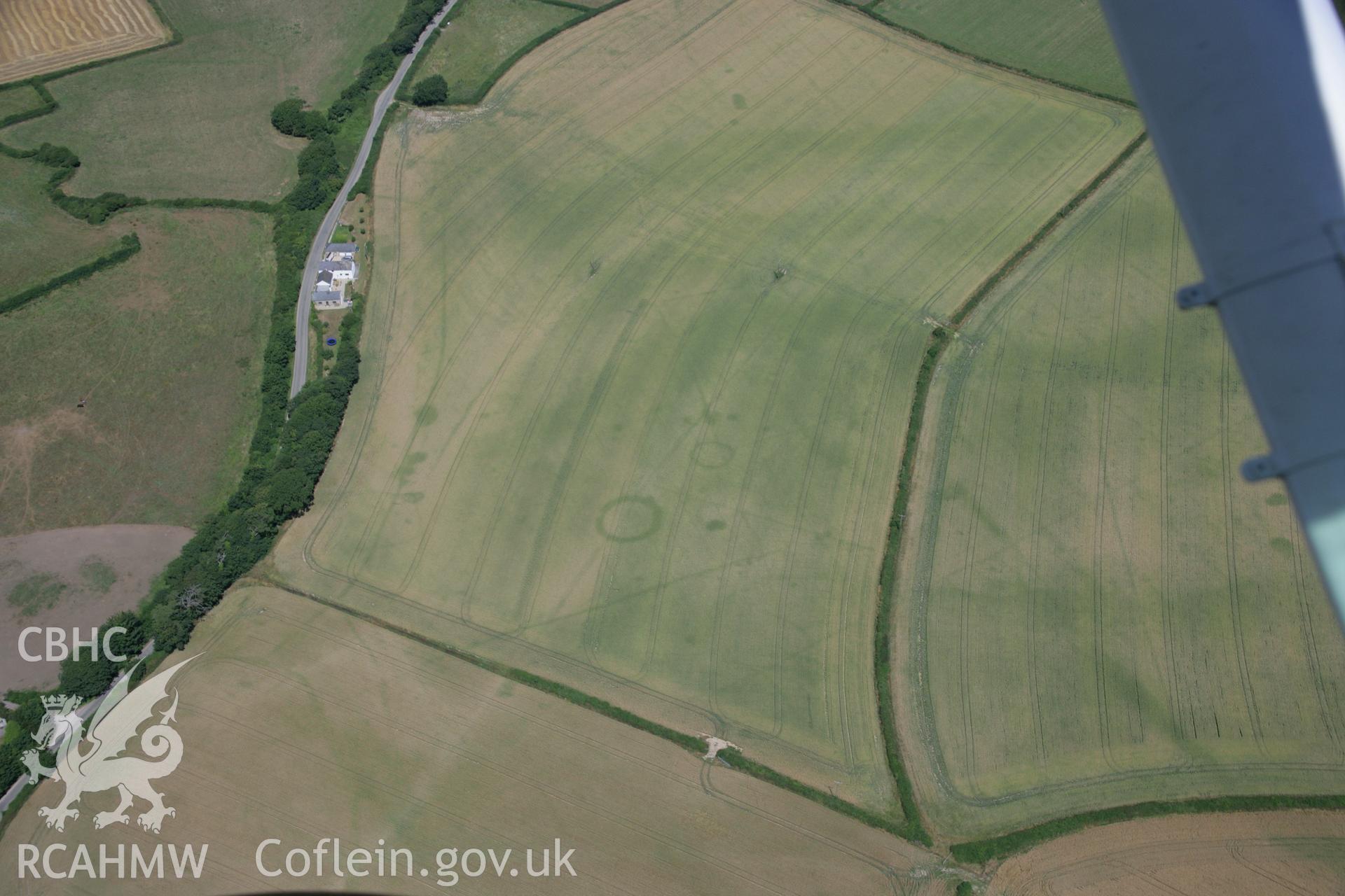 RCAHMW colour oblique aerial photograph of St Donat's Deserted Village. Taken on 24 July 2006 by Toby Driver.