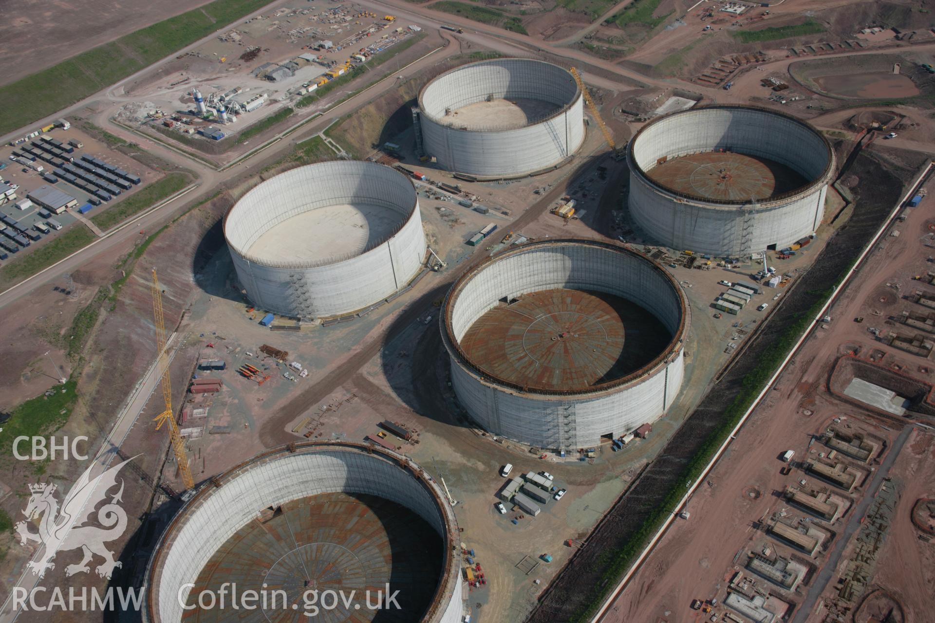 RCAHMW colour oblique aerial photograph of Esso South Hook Oil Refinery and liquid natural gas facility, Milford Haven, from the north-west. Taken on 08 June 2006 by Toby Driver.