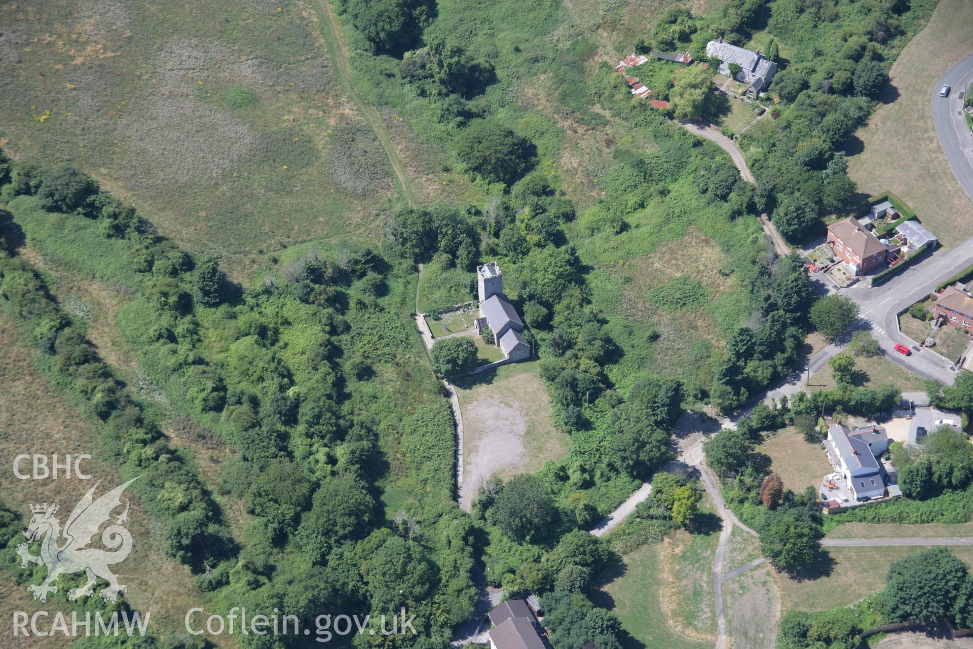 RCAHMW colour oblique aerial photograph of Saints Dyfan and Teilo Church, Merthyr Dyfan Road. Taken on 24 July 2006 by Toby Driver.