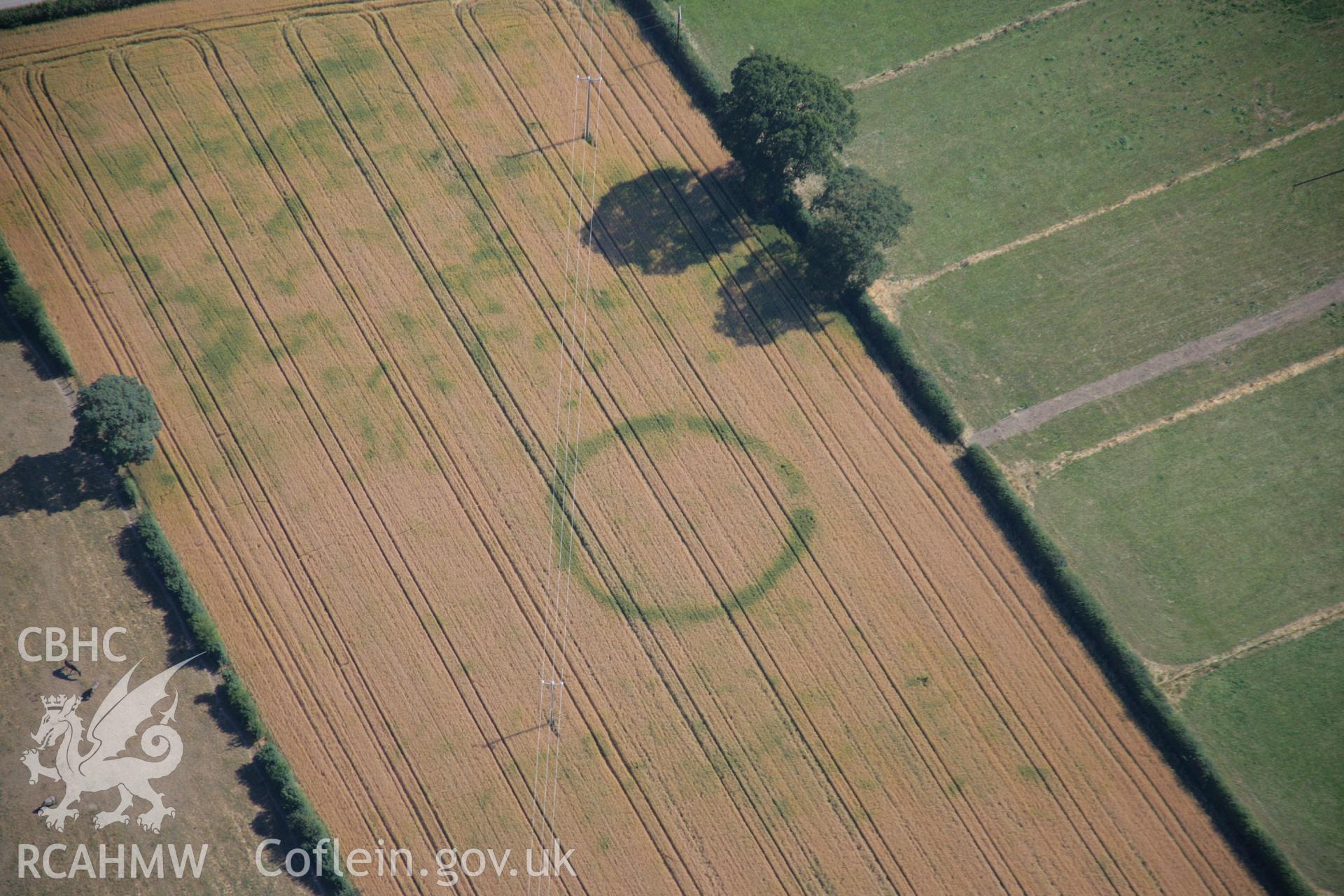 RCAHMW colour oblique aerial photograph of Four Crosses Barrow Cemetery, Site 7. Taken on 17 July 2006 by Toby Driver