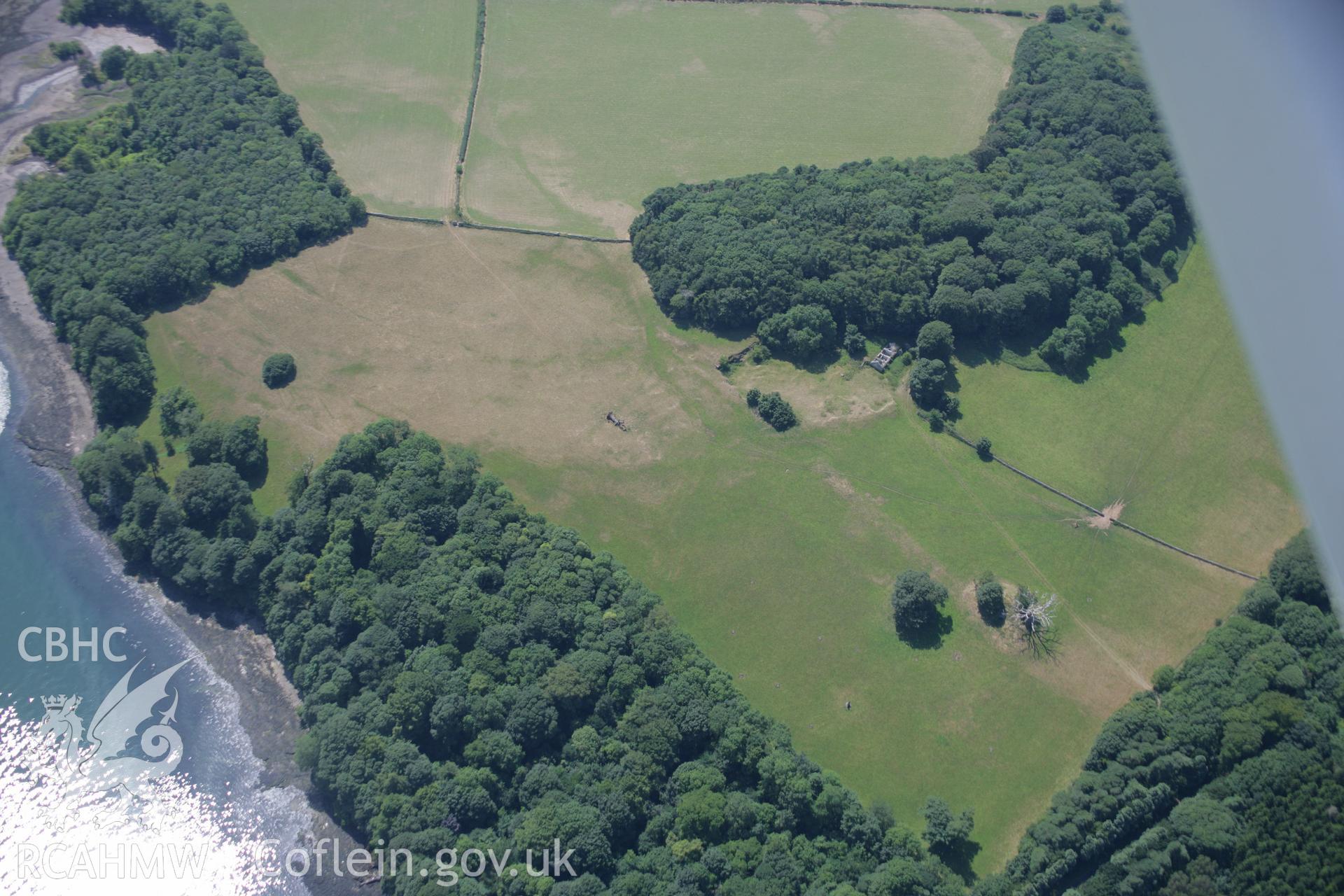 RCAHMW colour oblique aerial photograph of Bryn-Yr-Hen Bobl Chambered Tomb and Terrace. Taken on 18 July 2006 by Toby Driver.