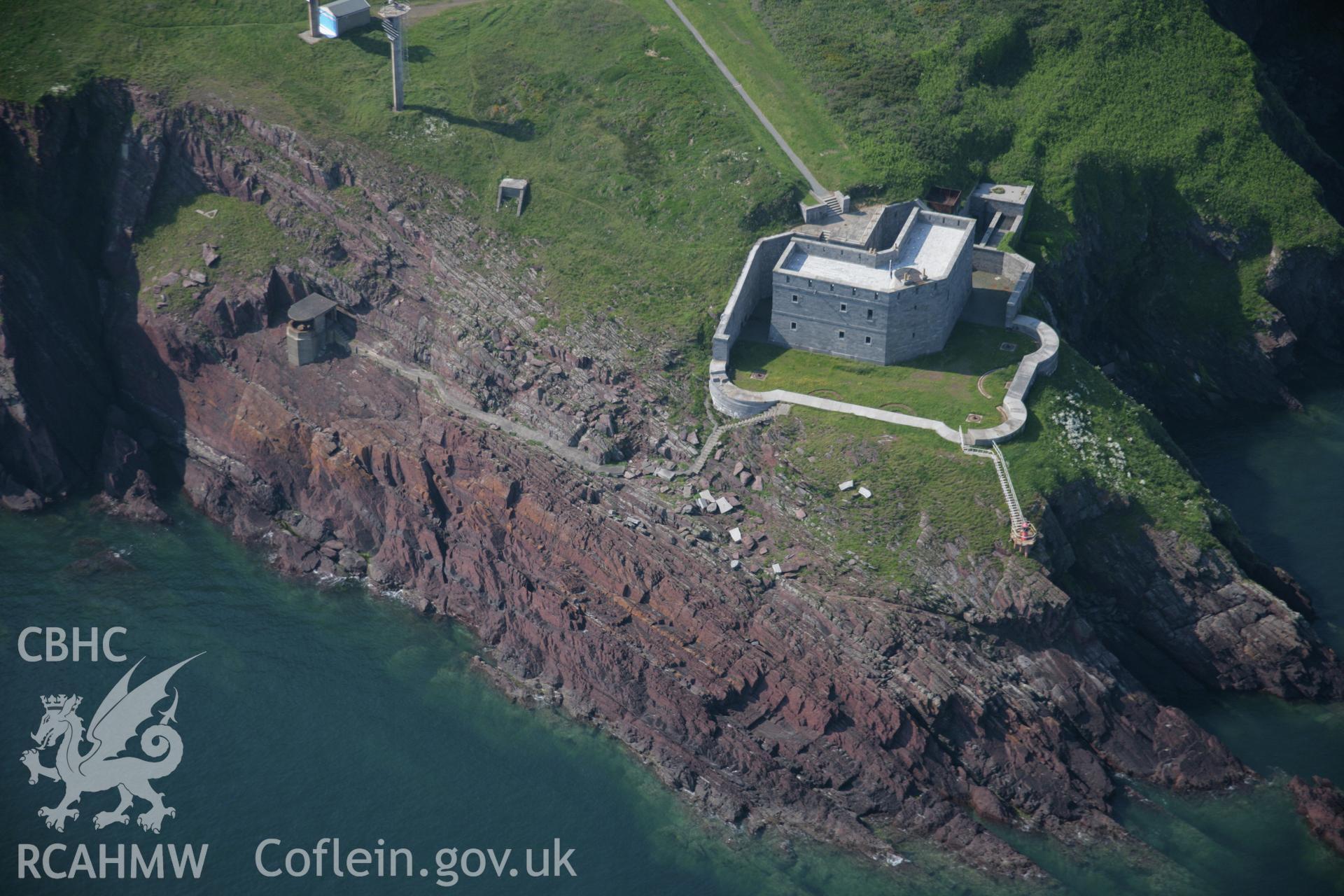 RCAHMW colour oblique aerial photograph of West Blockhouse Fort from the south-east. Taken on 08 June 2006 by Toby Driver.