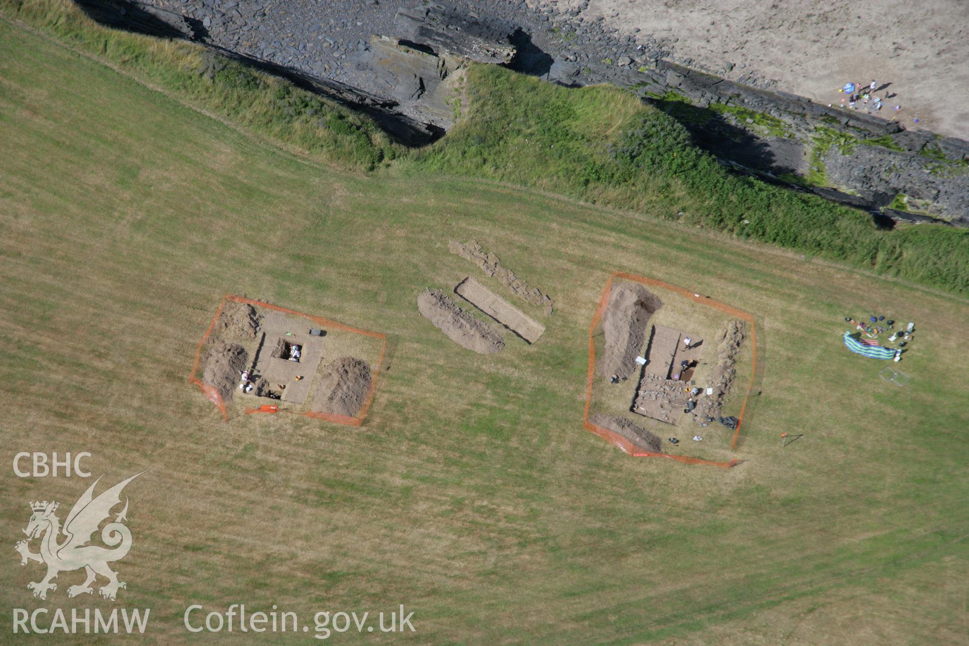 RCAHMW colour oblique aerial photograph of West Angle Bay Cemetery and Enclosure showing excavations. Taken on 24 July 2006 by Toby Driver.