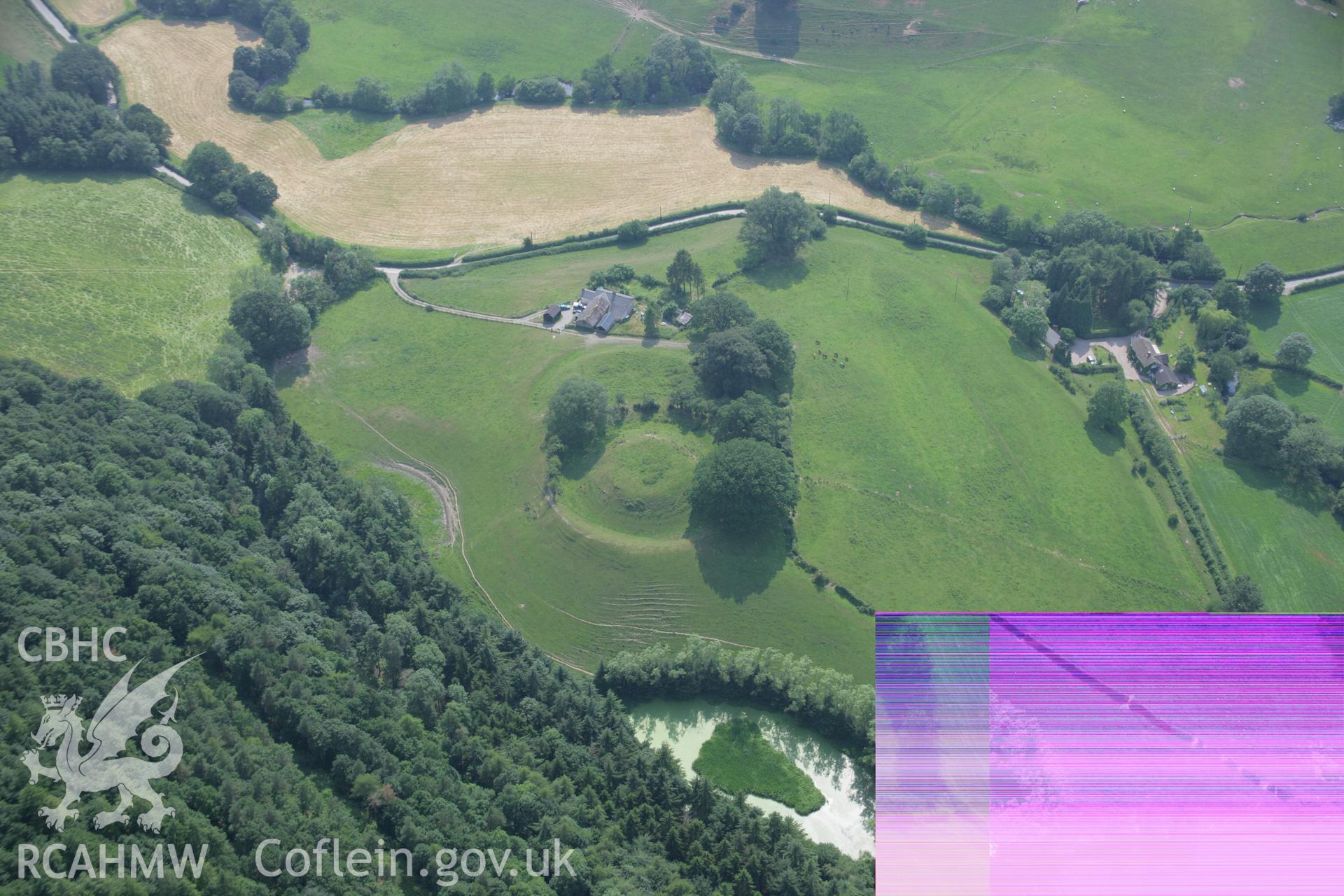 RCAHMW colour oblique aerial photograph of Sycharth Castle, Llansilin. Taken on 04 July 2006 by Toby Driver.