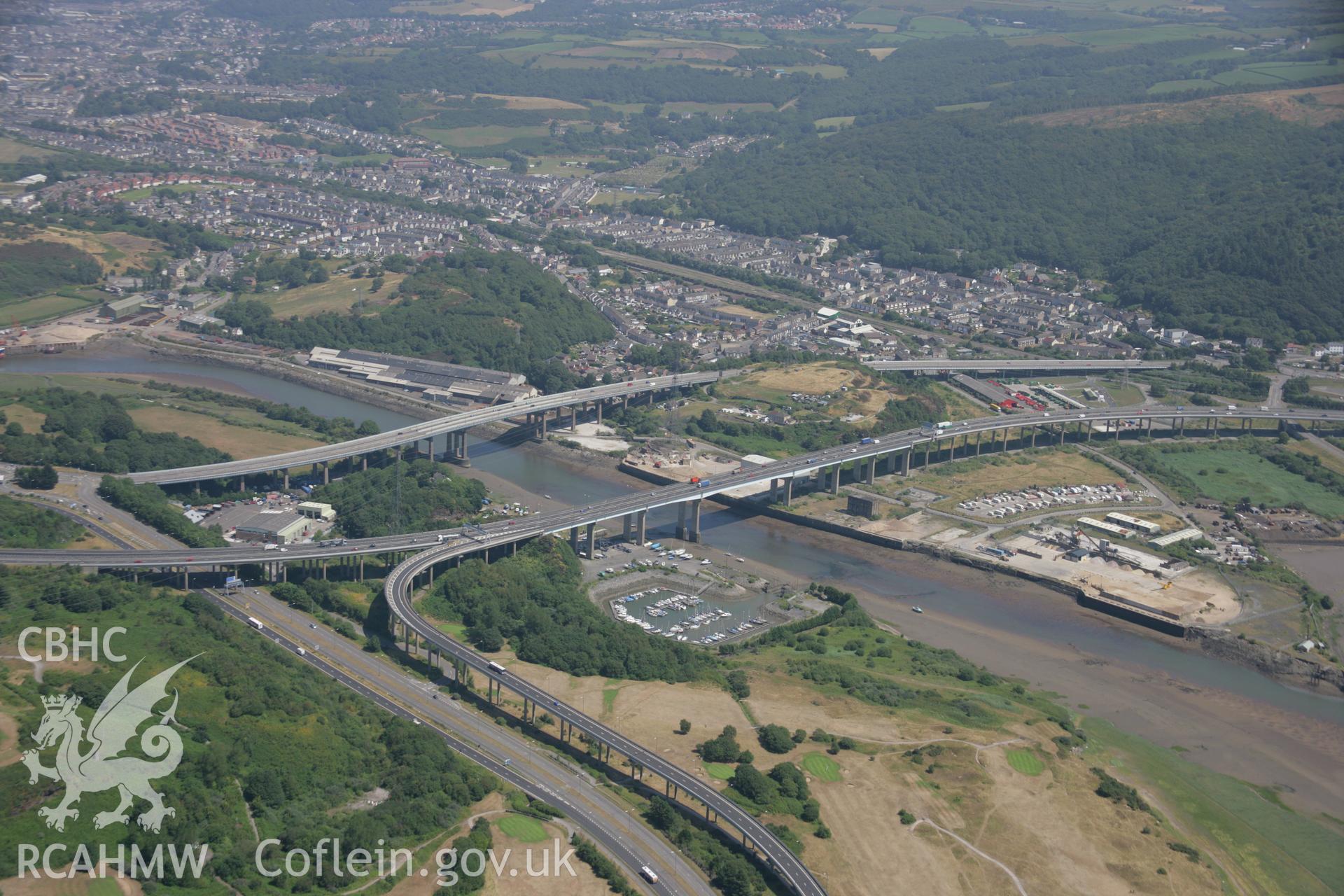 RCAHMW colour oblique aerial photograph of A48 Road Bridge over R.Neath, Briton Ferry. Taken on 24 July 2006 by Toby Driver.