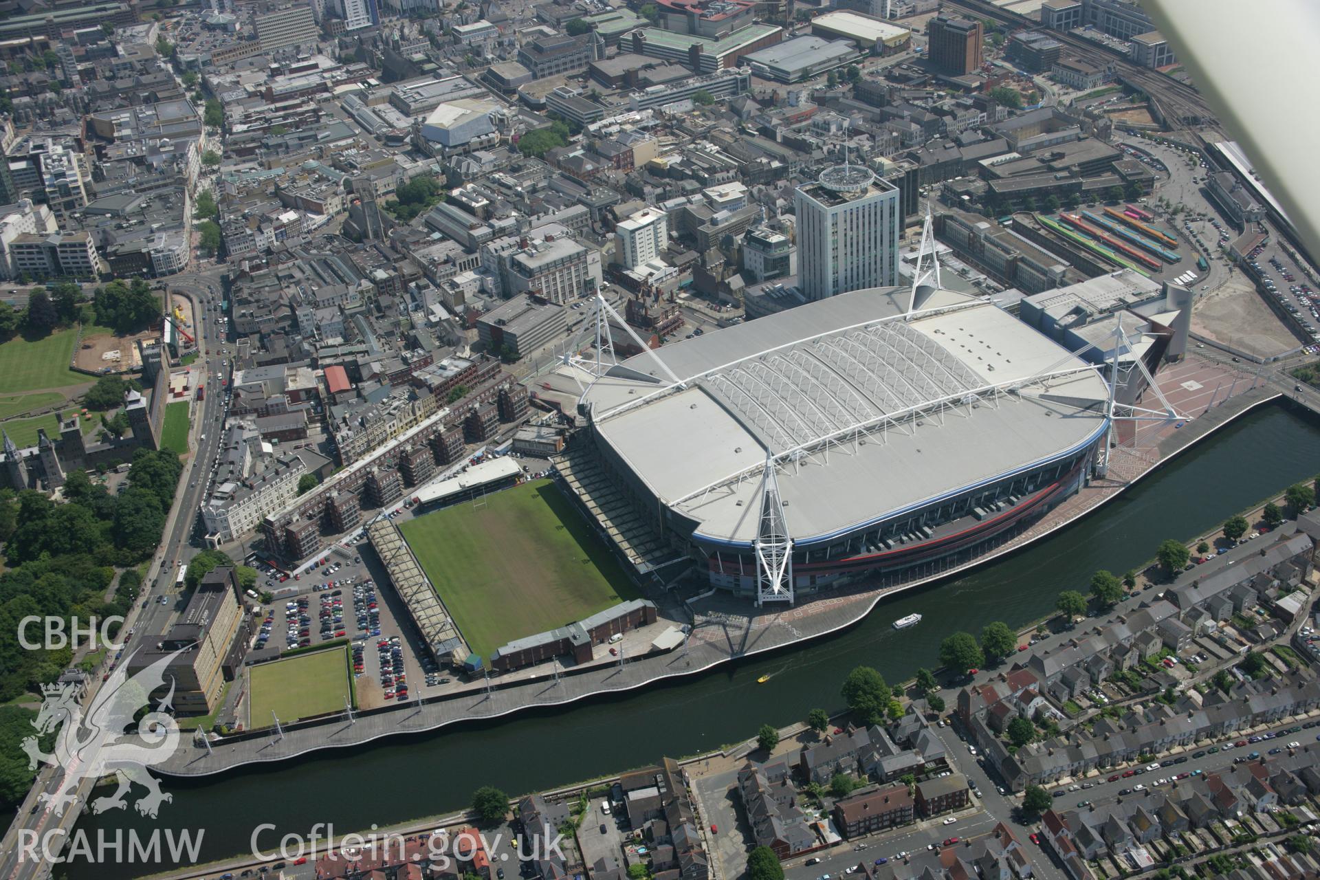 RCAHMW colour oblique photograph of Cardiff city centre and Millennium Stadium. Taken by Toby Driver on 29/06/2006.