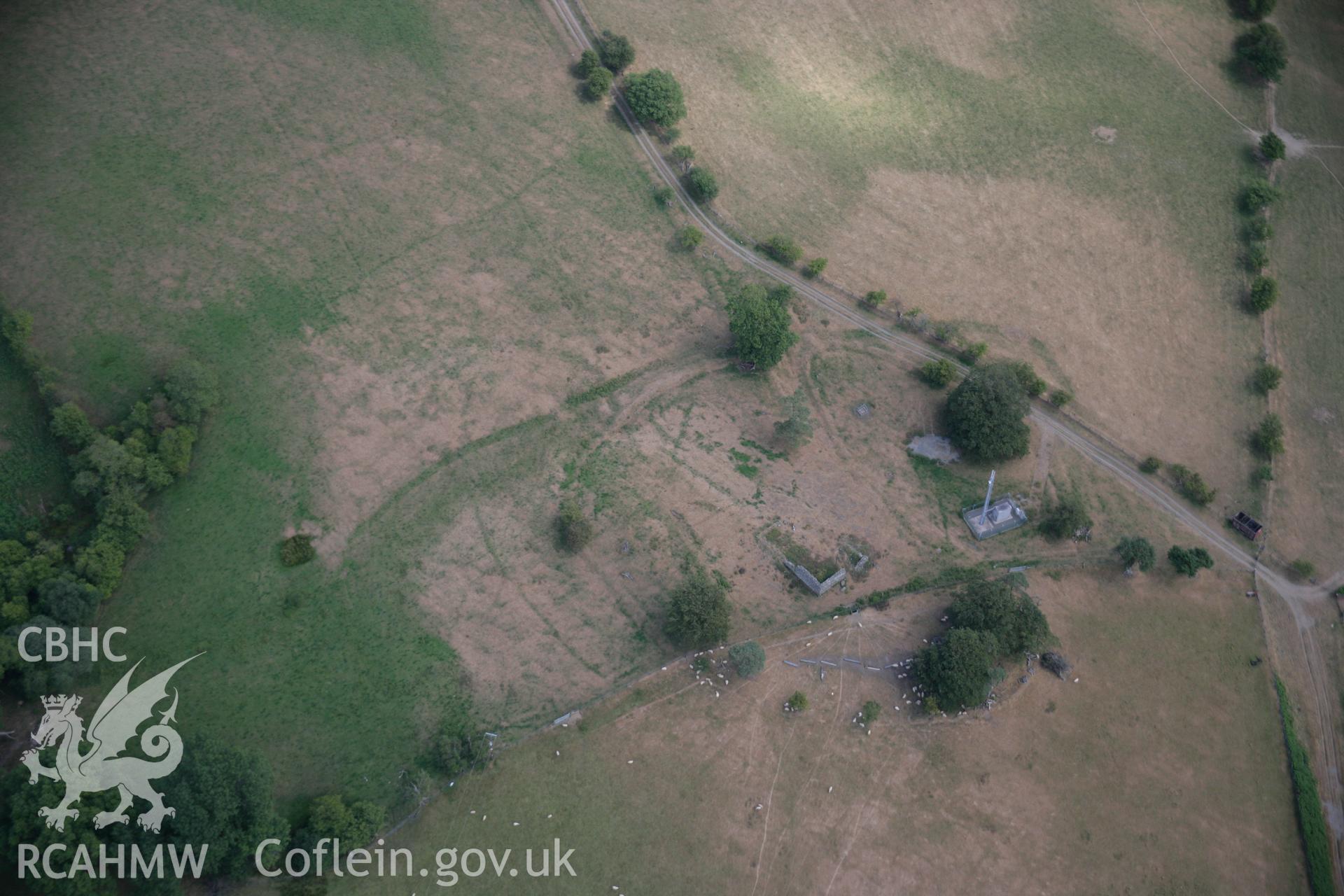 RCAHMW colour oblique aerial photograph of Treflys Defended Enclosure and Earthworks showing as cropmarks. Taken on 27 July 2006 by Toby Driver.