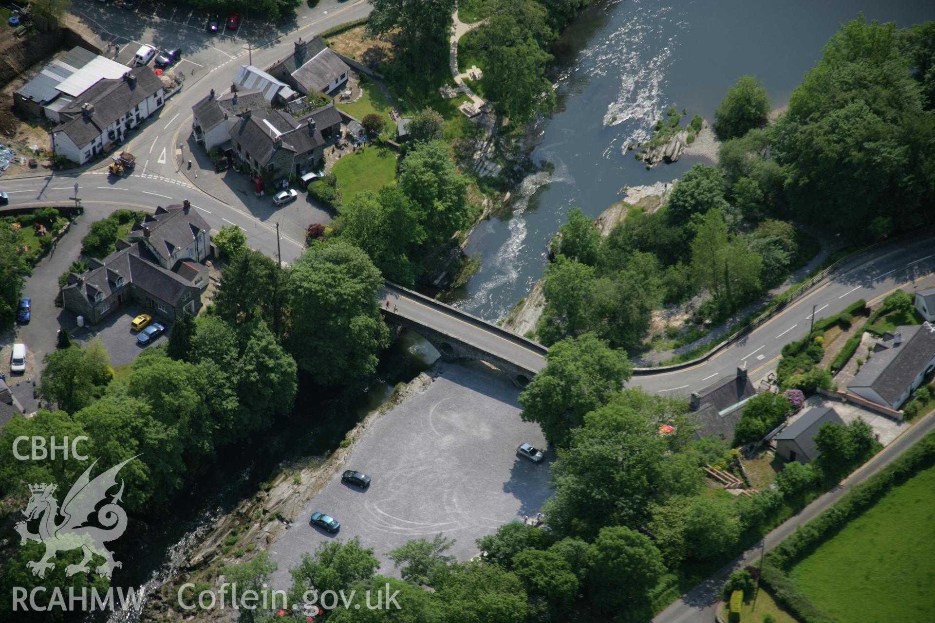 RCAHMW colour oblique aerial photograph of Cenarth Bridge from the north-east. Taken on 08 June 2006 by Toby Driver.