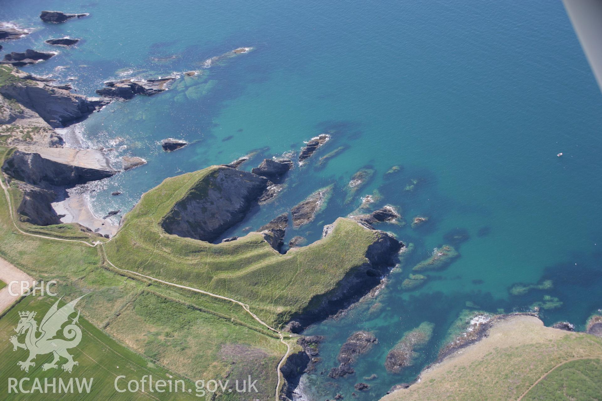 RCAHMW colour oblique aerial photograph of Porth-y-Rhaw Promontory Fort. Taken on 14 July 2006 by Toby Driver.
