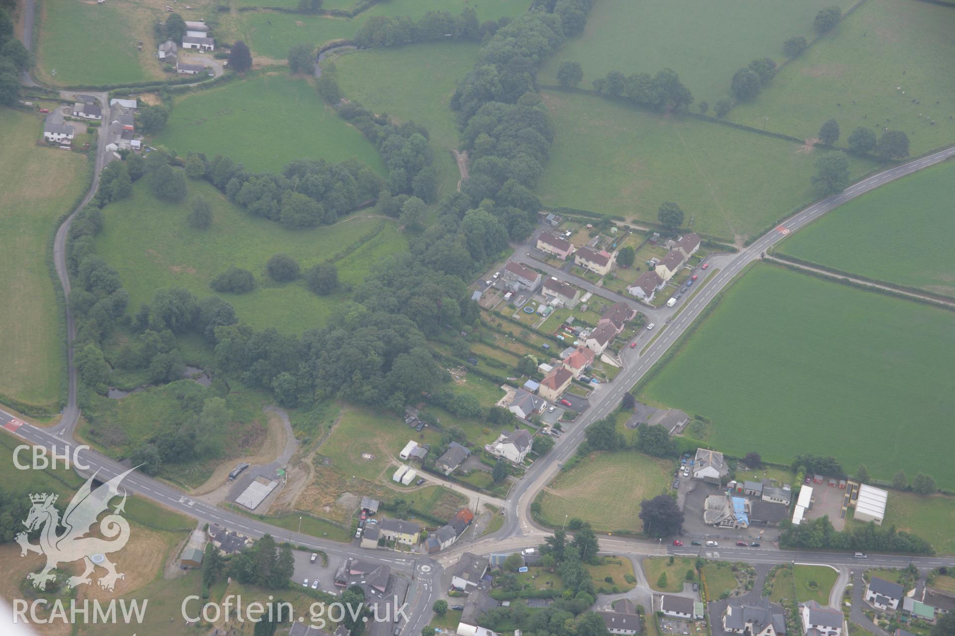 RCAHMW colour oblique aerial photograph of Llanwnnen Castle. Taken on 21 July 2006 by Toby Driver.