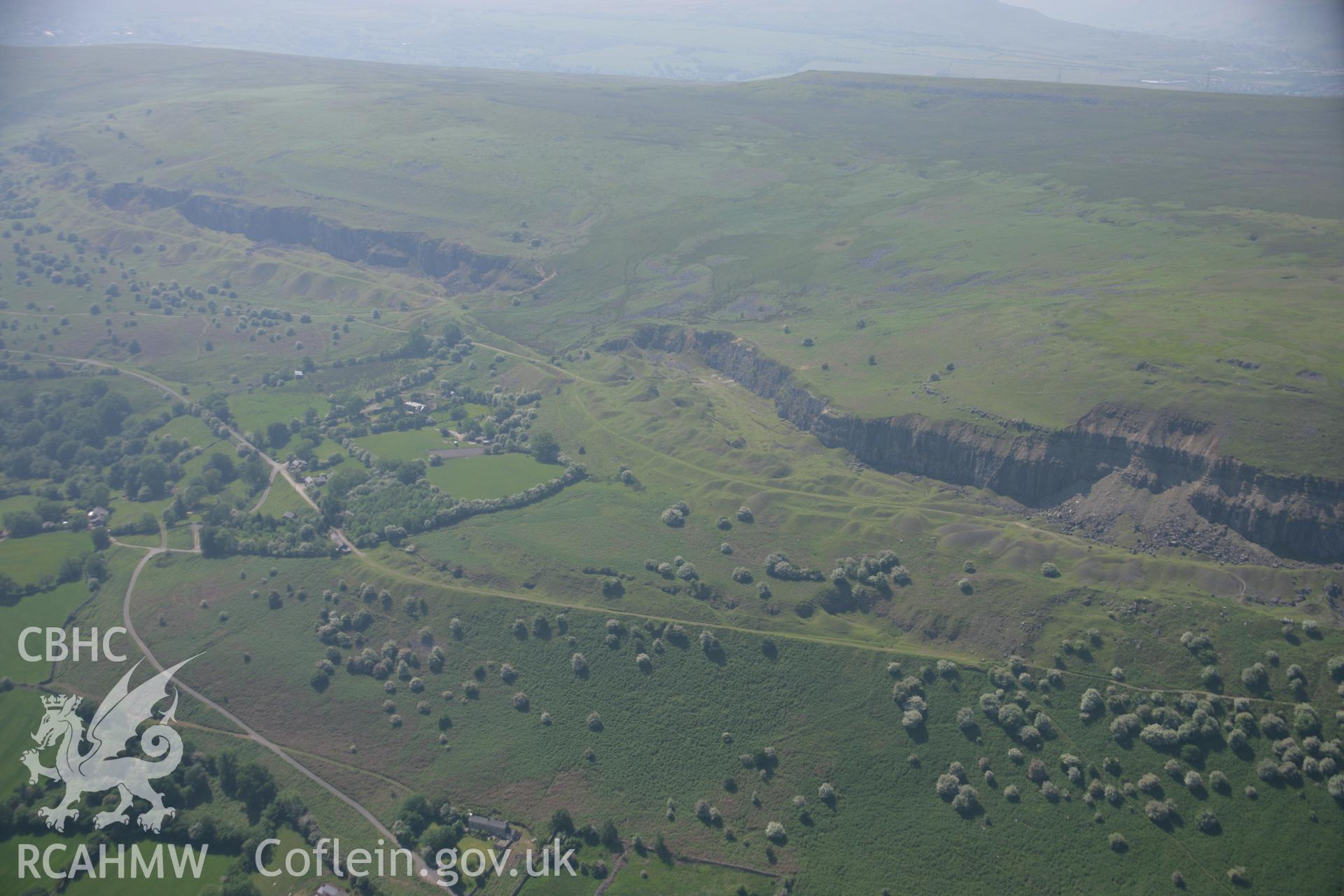 RCAHMW colour oblique aerial photograph of Pant-y-Rhiw Quarry, viewed from the north-west. Taken on 09 June 2006 by Toby Driver.