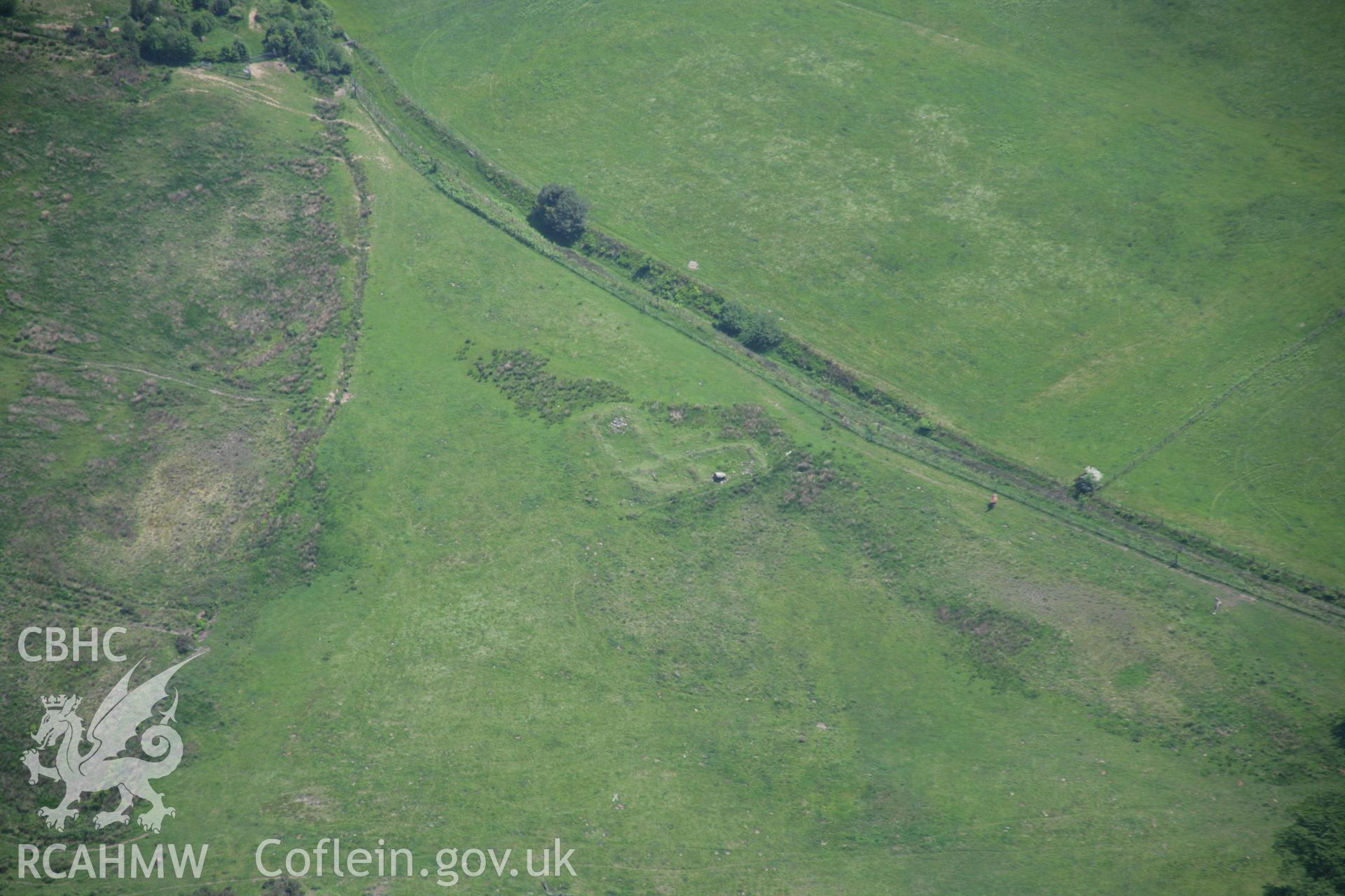 RCAHMW colour oblique aerial photograph of Llanderfel Church, viewed from the north-west. Taken on 09 June 2006 by Toby Driver.