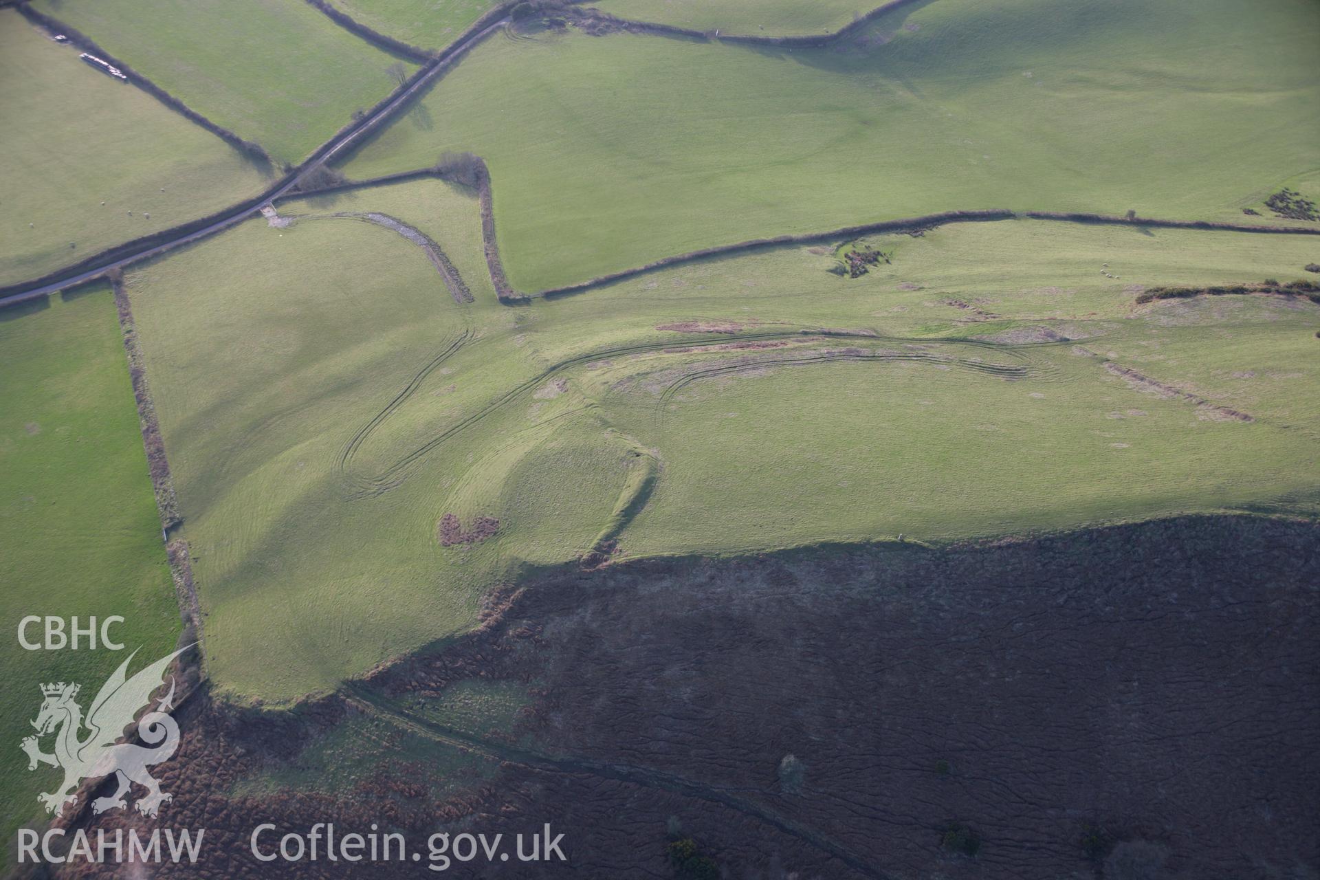 RCAHMW colour oblique aerial photograph of Cil Ifor Top Promontory Fort from the north-east. Taken on 26 January 2006 by Toby Driver.