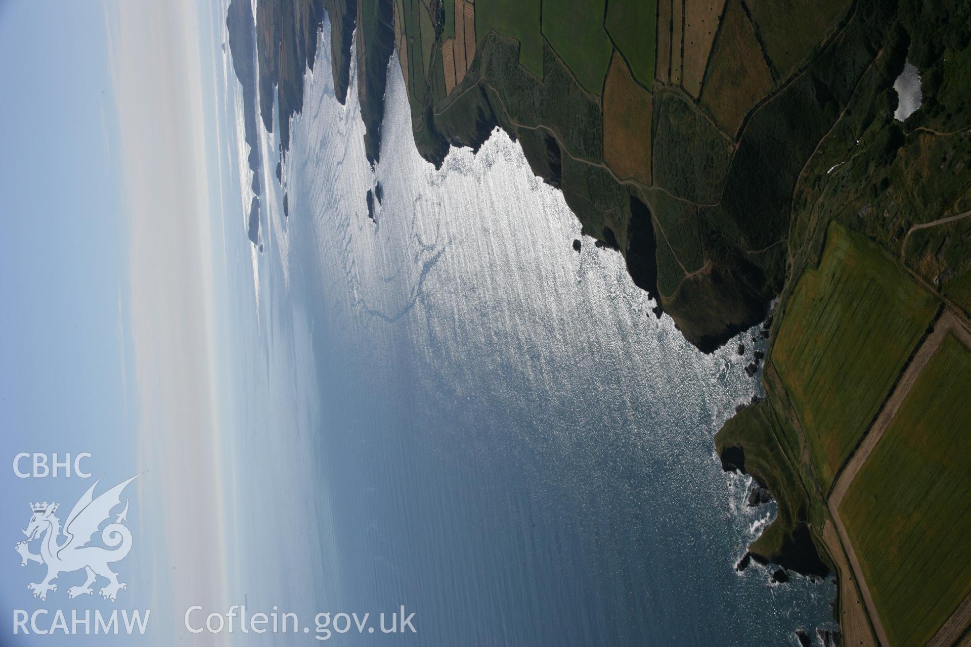 RCAHMW colour oblique aerial photograph of Porth-y-Rhaw Promontory Fort. Taken on 24 July 2006 by Toby Driver.