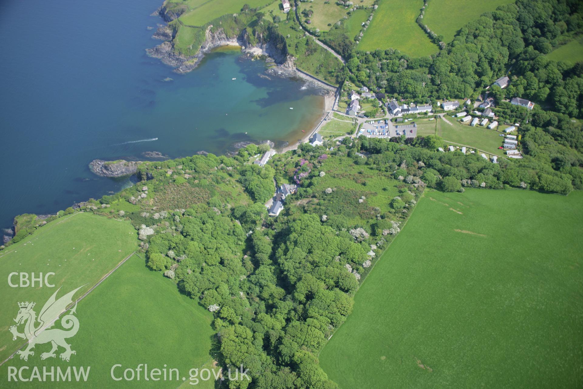 RCAHMW colour oblique aerial photograph of Dinas Island Castell viewed from the north-west. Taken on 08 June 2006 by Toby Driver.