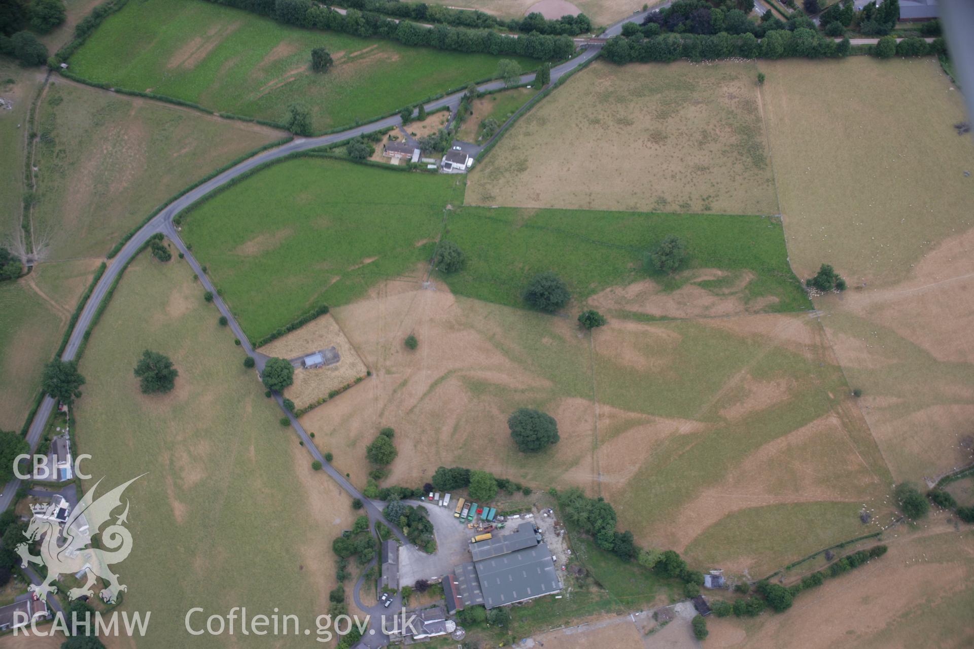 RCAHMW colour oblique aerial photograph of former grounds and gardens at Tonn. Taken on 27 July 2006 by Toby Driver.