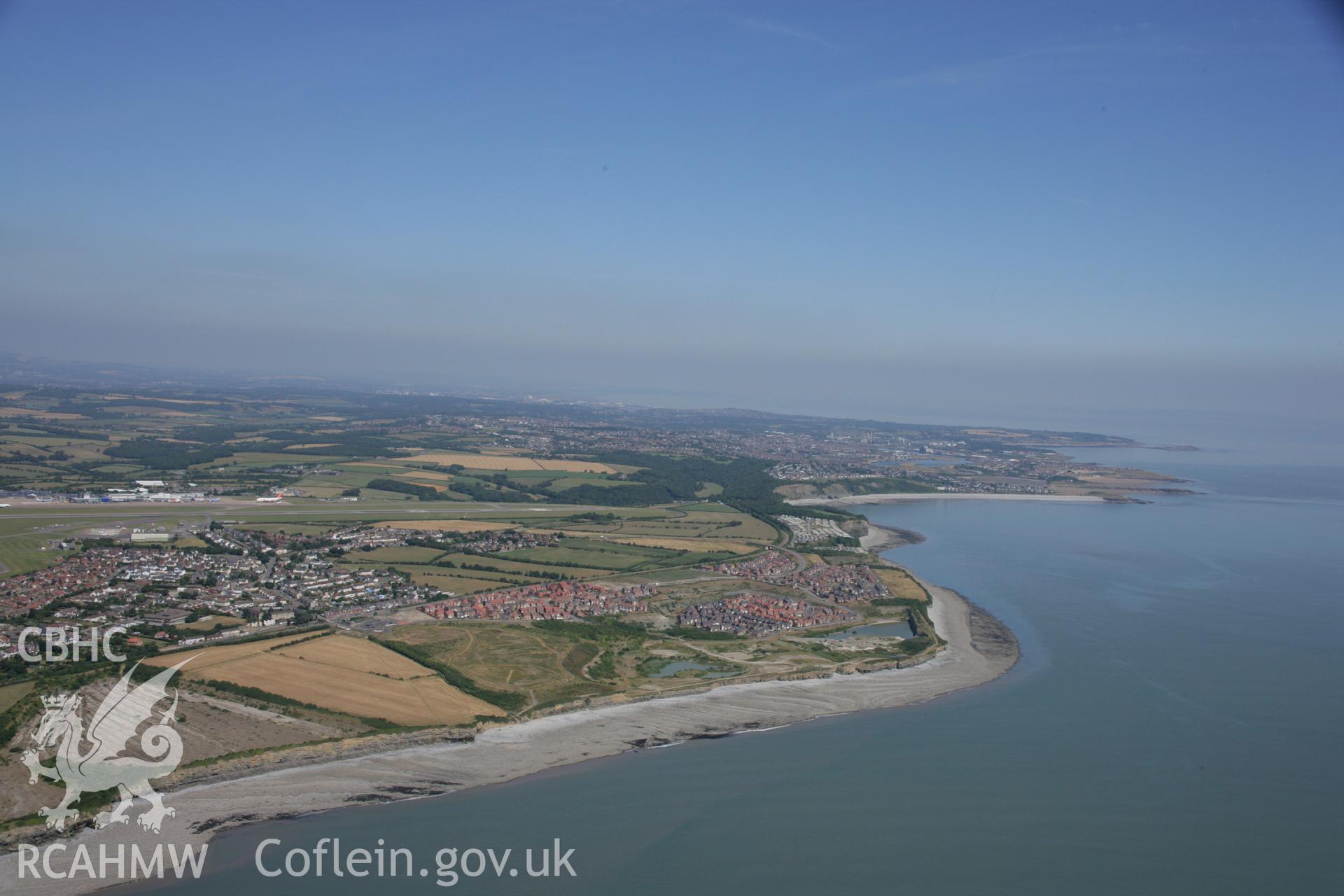 RCAHMW colour oblique aerial photograph of Rhoose landscape, including Primary School. Taken on 24 July 2006 by Toby Driver
