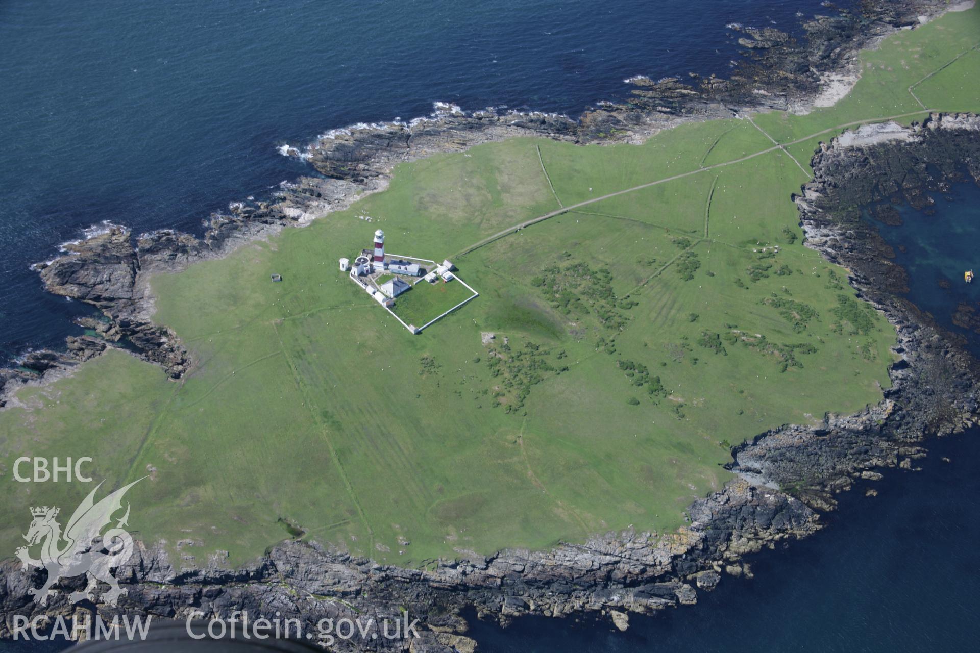 RCAHMW colour oblique aerial photograph of Bardsey Island Lighthouse from the south-east. Taken on 14 June 2006 by Toby Driver.