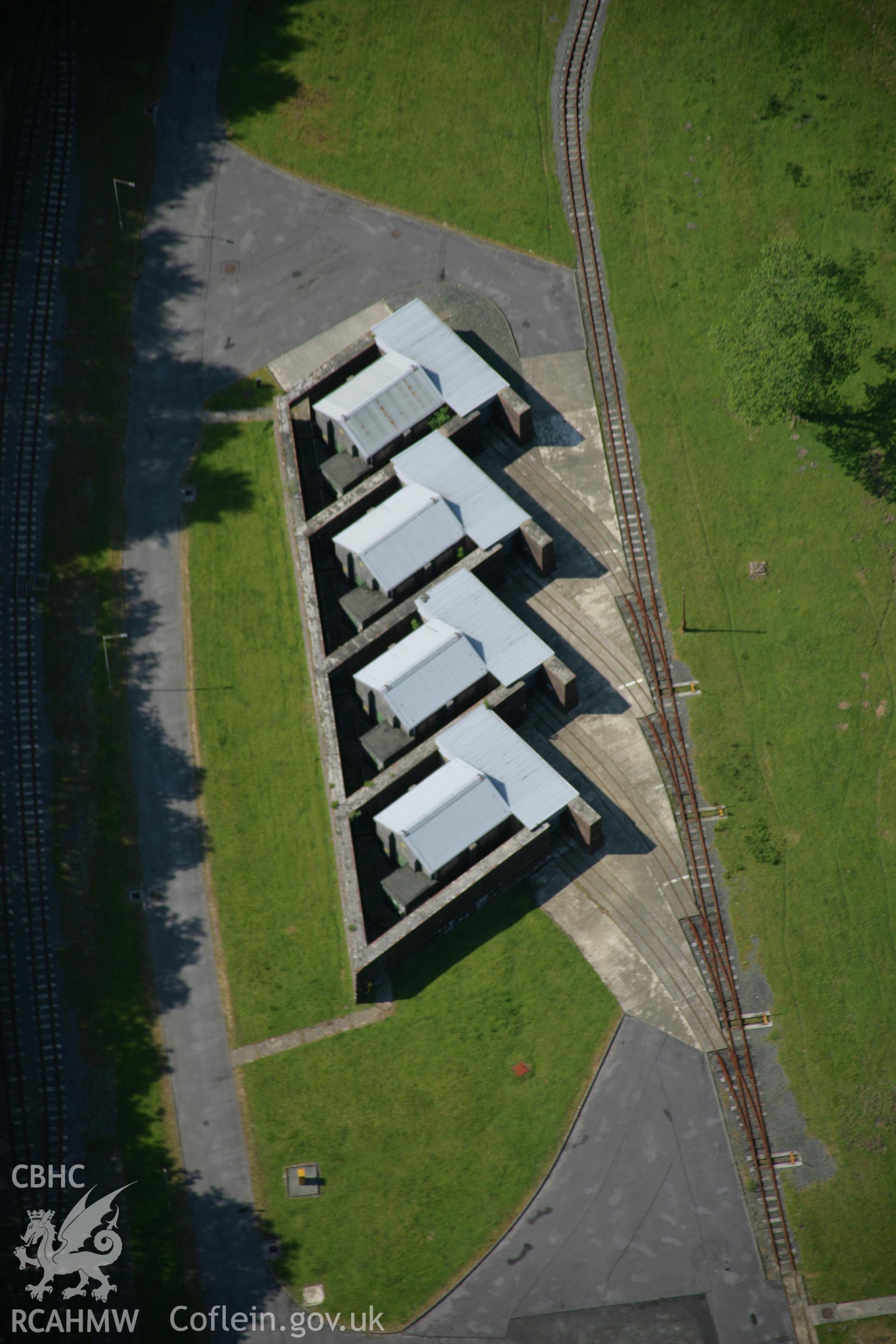 RCAHMW colour oblique aerial photograph of RNAD Trecwn from the south-east showing bunkers in the northern valley.. Taken on 08 June 2006 by Toby Driver.