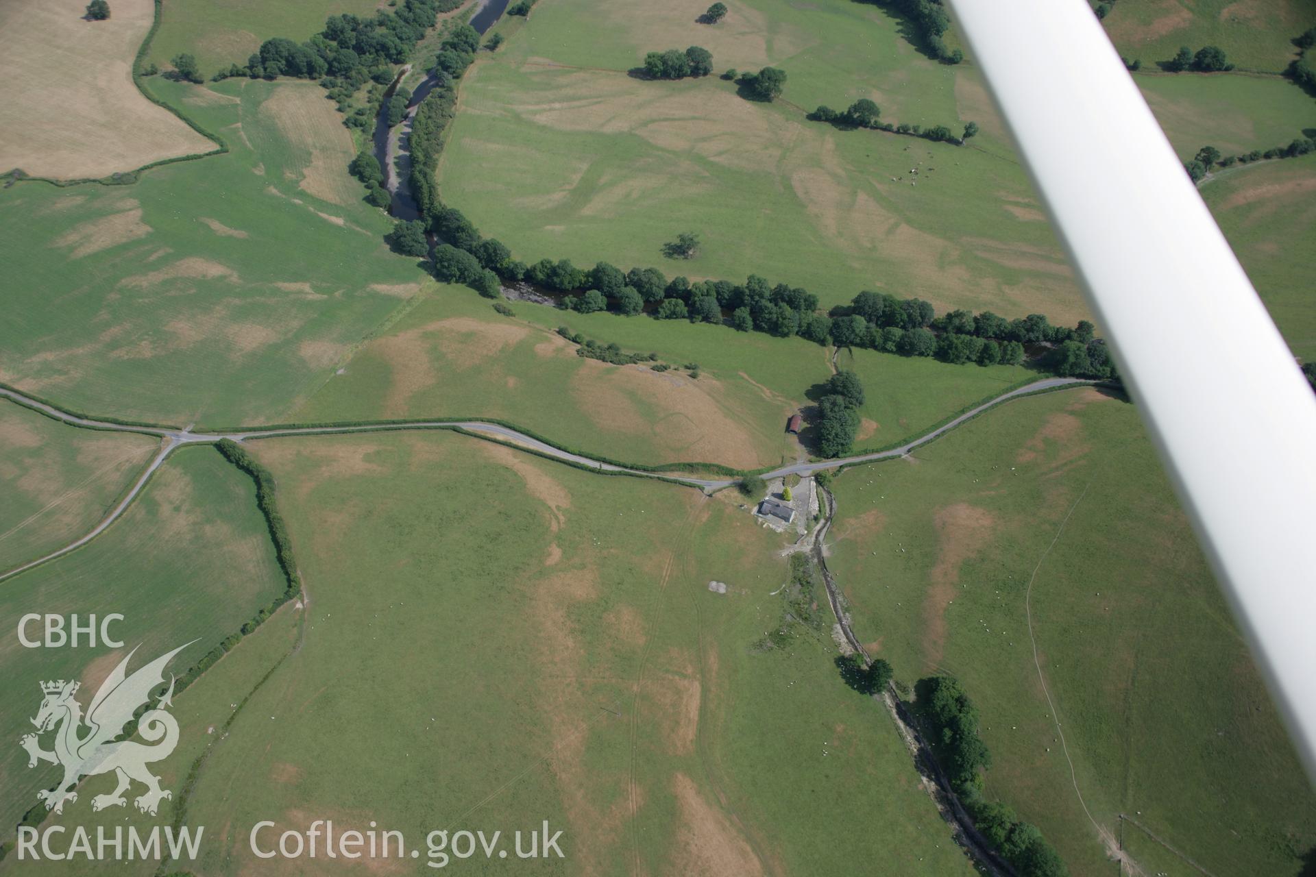 RCAHMW colour oblique aerial photograph of the Roman fortlet at Hafan. Taken on 25 July 2006 by Toby Driver.