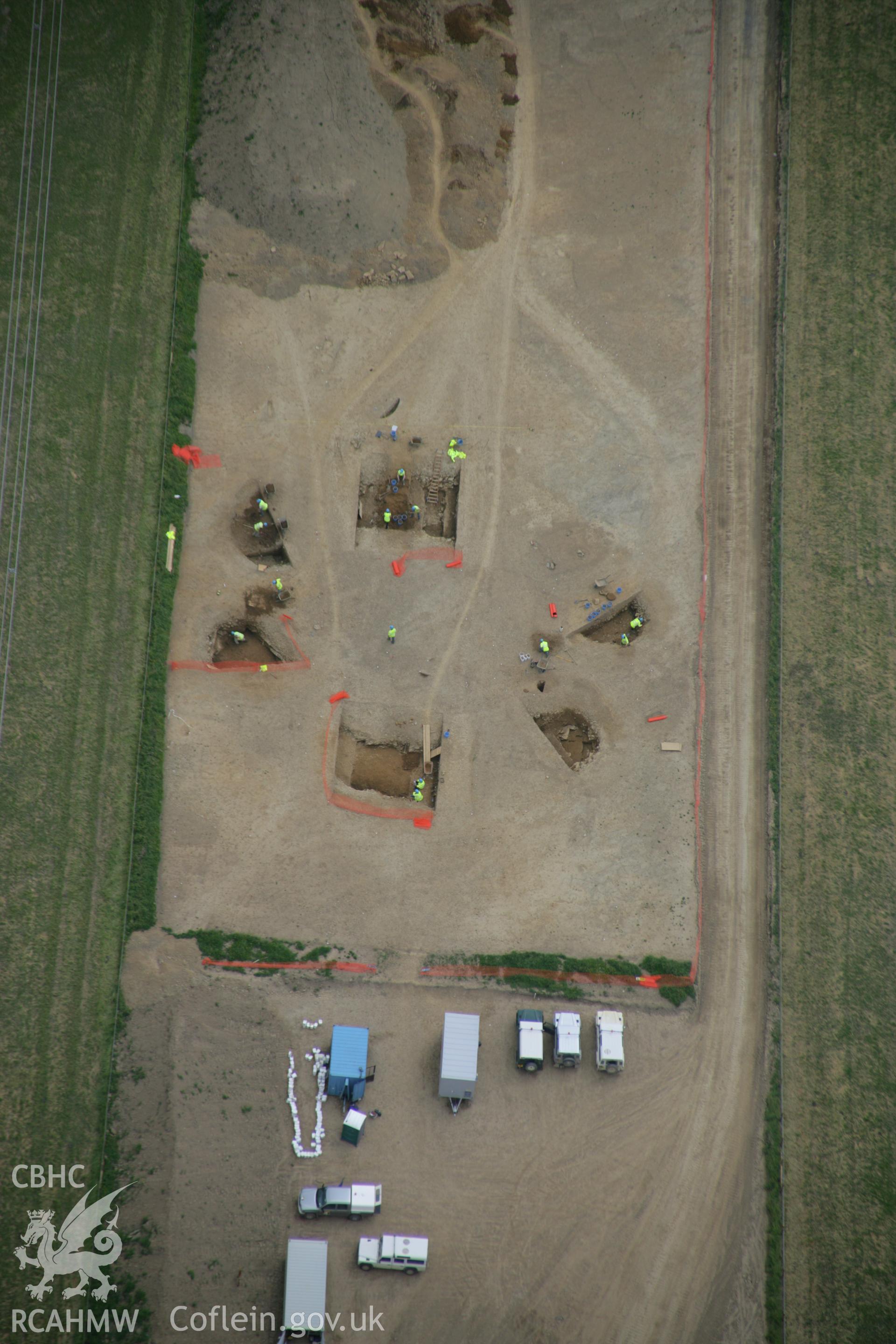 RCAHMW colour oblique aerial photograph of Vaynor Farm Henge showing excavations. Taken on 15 June 2006 by Toby Driver.
