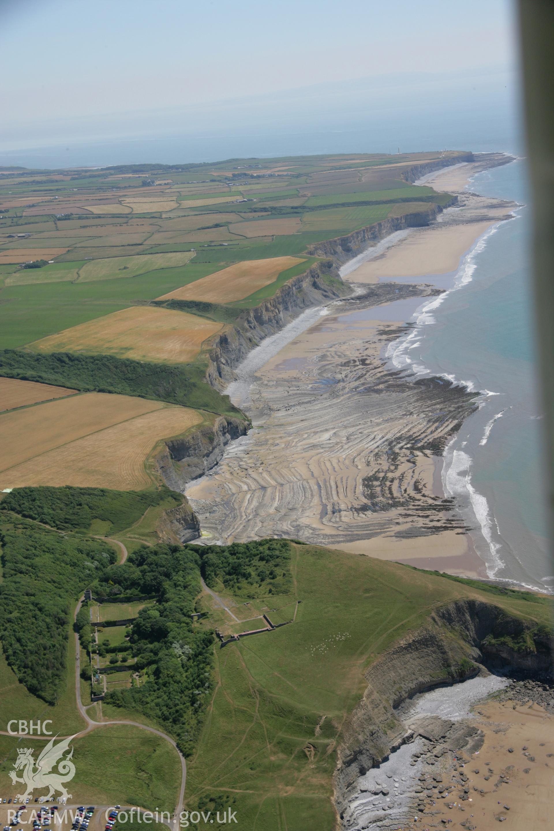 RCAHMW colour oblique aerial photograph of Dunraven Hillfort. Taken on 24 July 2006 by Toby Driver.