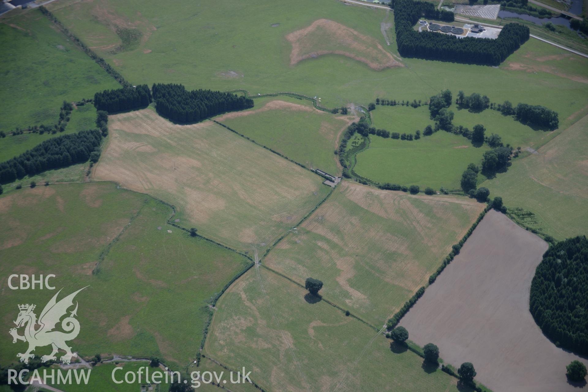 RCAHMW colour oblique aerial photograph of Llanfor Roman Fort. Taken on 25 July 2006 by Toby Driver.