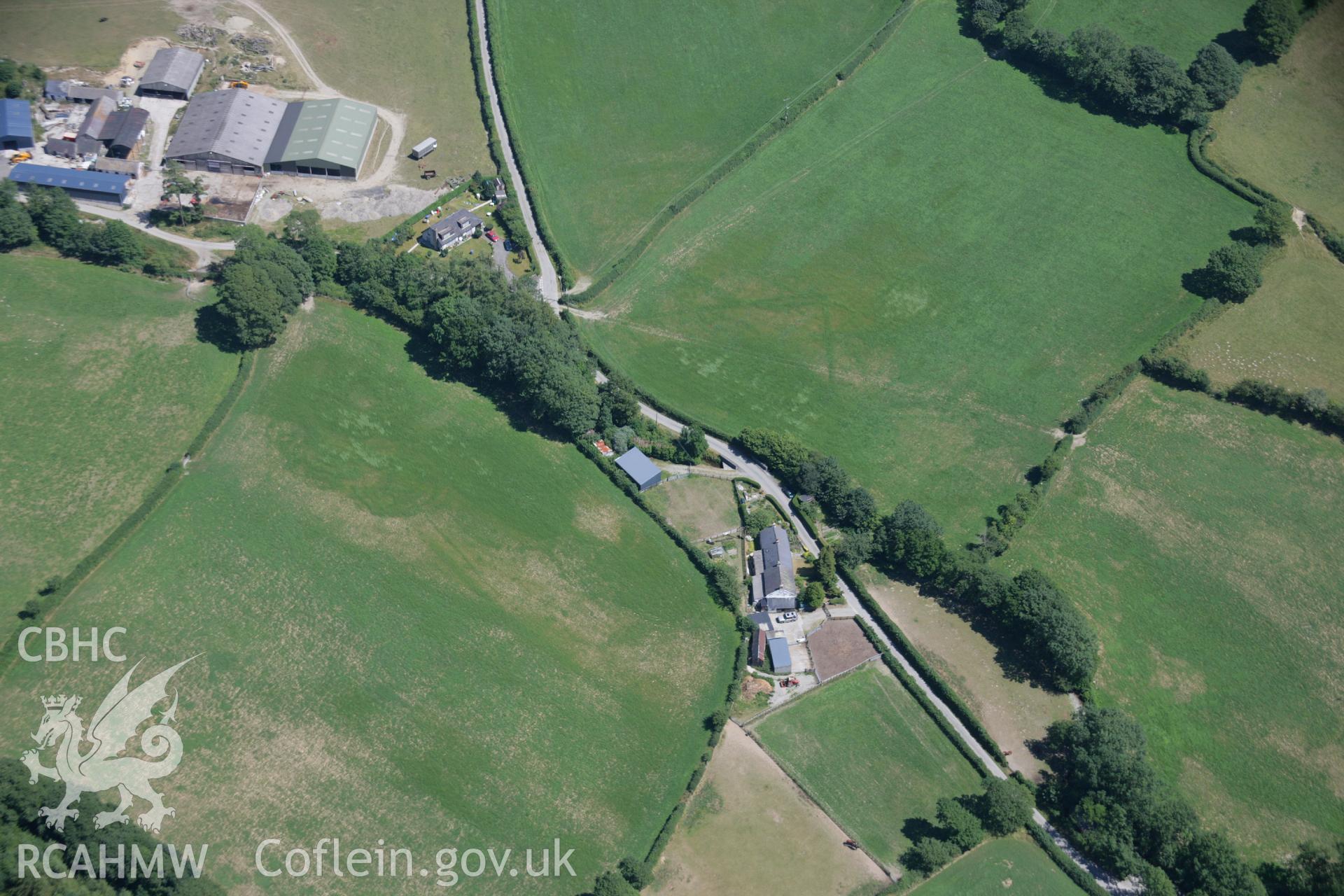 RCAHMW colour oblique aerial photograph of the cropmarks at Cyncoed that possibly represent an enclosure.. Taken on 17 July 2006 by Toby Driver.