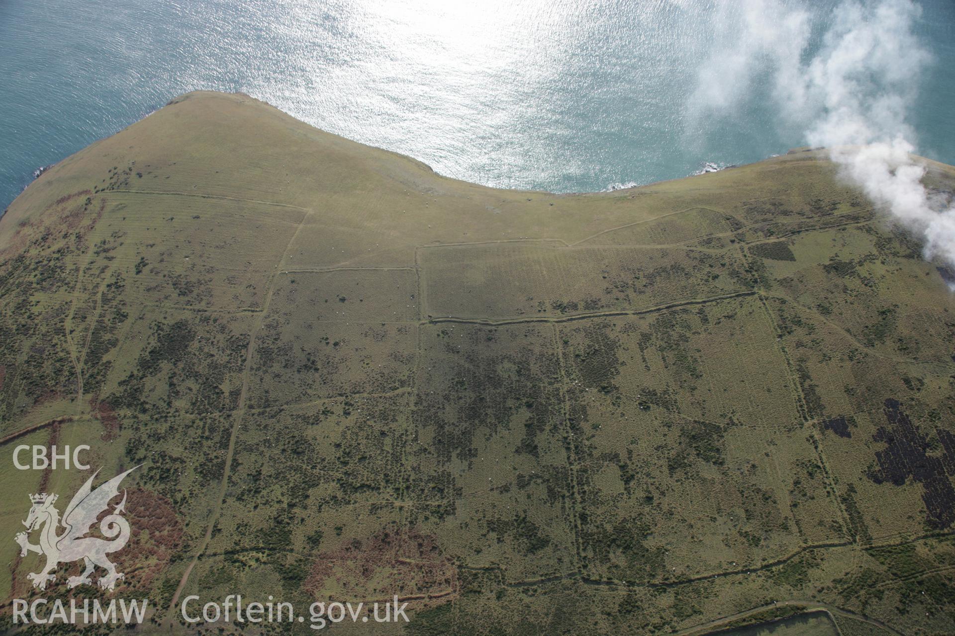 RCAHMW colour oblique aerial photograph of Mynydd Gilan Strip Field system, viewed from the north-east.. Taken on 09 February 2006 by Toby Driver