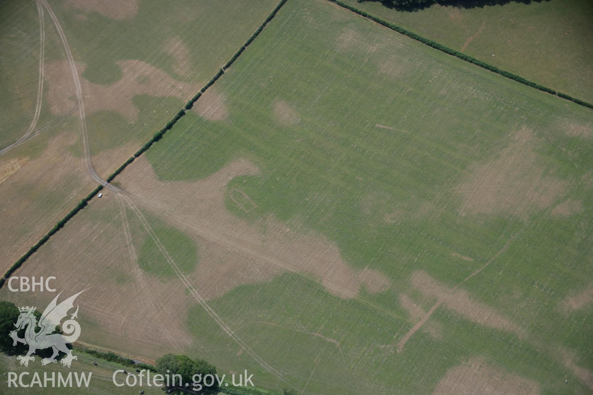 RCAHMW colour oblique aerial photograph of Llwydfaen Church. Taken on 25 July 2006 by Toby Driver.