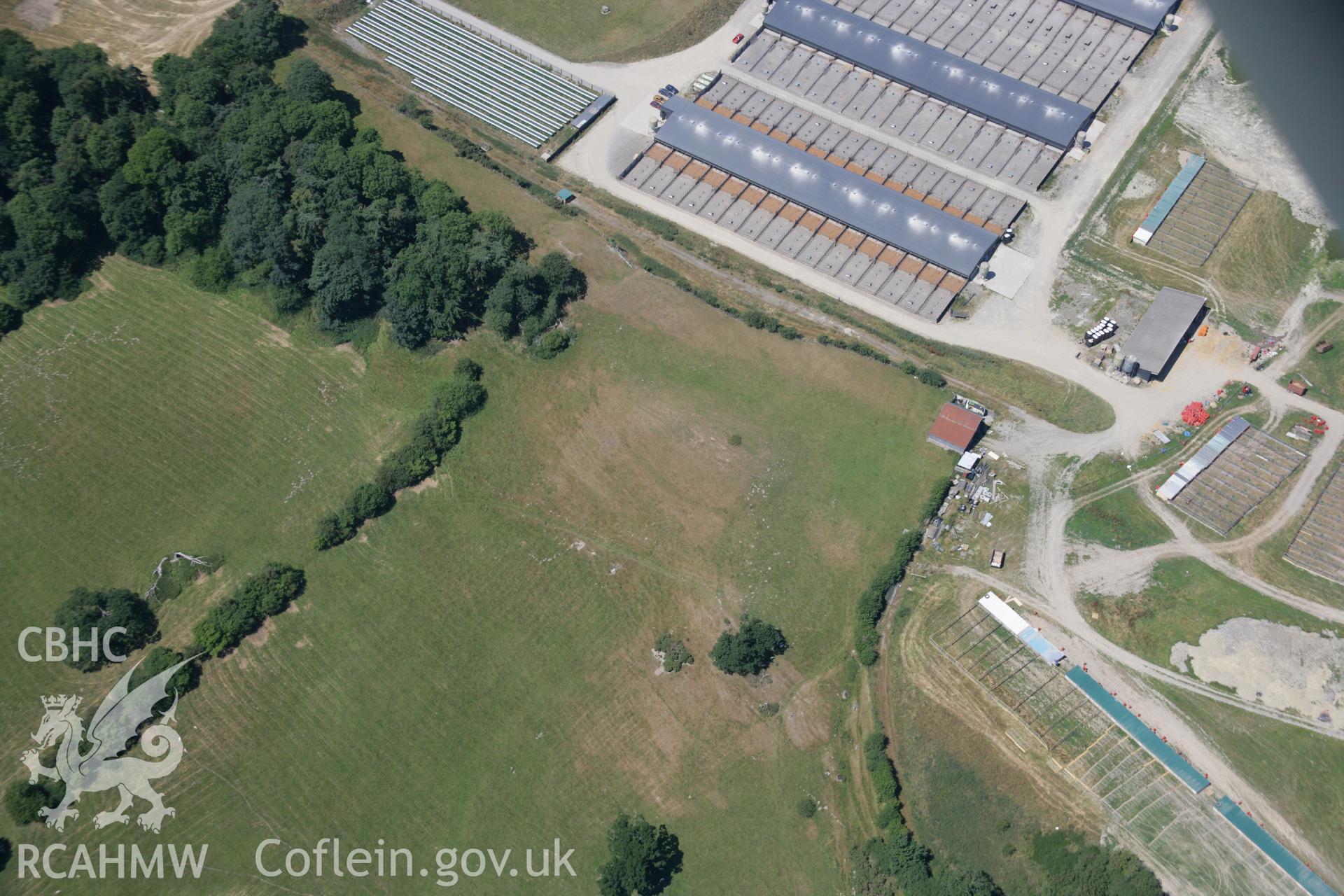 RCAHMW colour oblique aerial photograph of Caer Siac (Bettws Cedewain) motte and cropmarks Taken on 17 July 2006 by Toby Driver.
