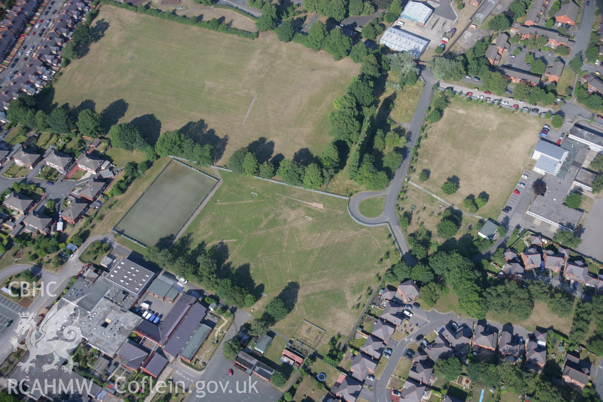 RCAHMW colour oblique aerial photograph of cropmarks of Former Barracks at Hightown. Taken on 17 July 2006 by Toby Driver.