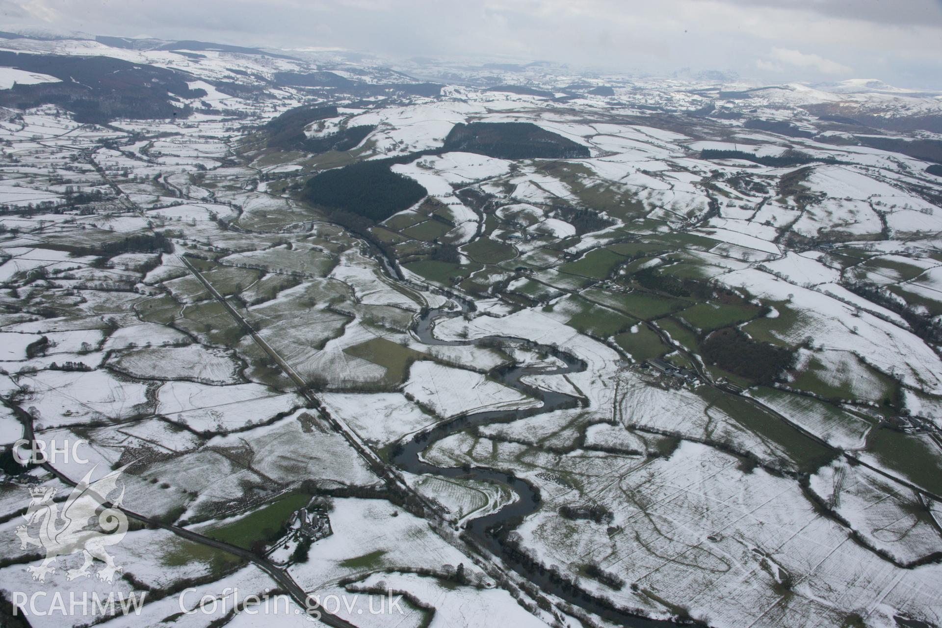 RCAHMW colour oblique aerial photograph of Llandrillo and Dee Valley, looking south-west from Cynwyd Taken on 06 March 2006 by Toby Driver.