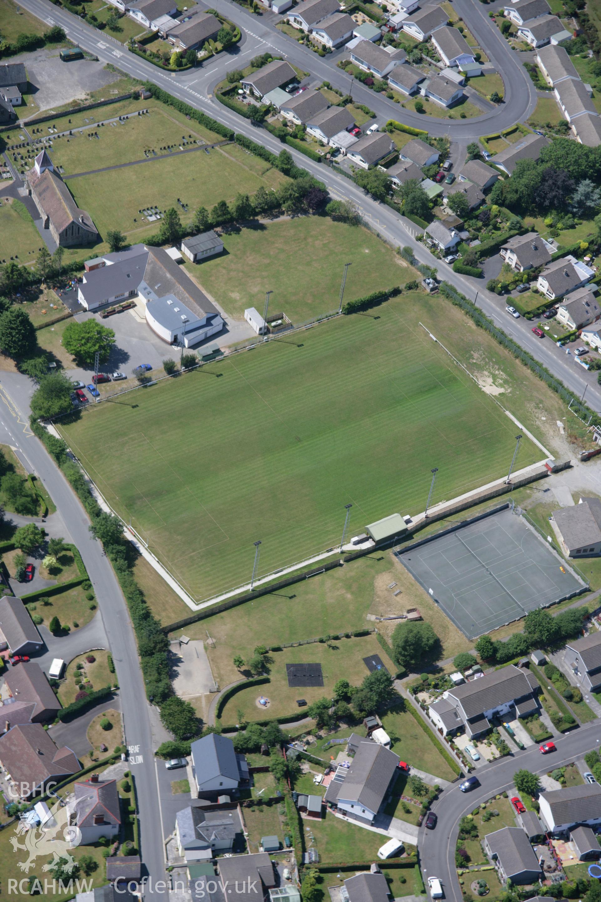 RCAHMW colour oblique aerial photograph of Penrhyncoch Village. Taken on 17 July 2006 by Toby Driver.