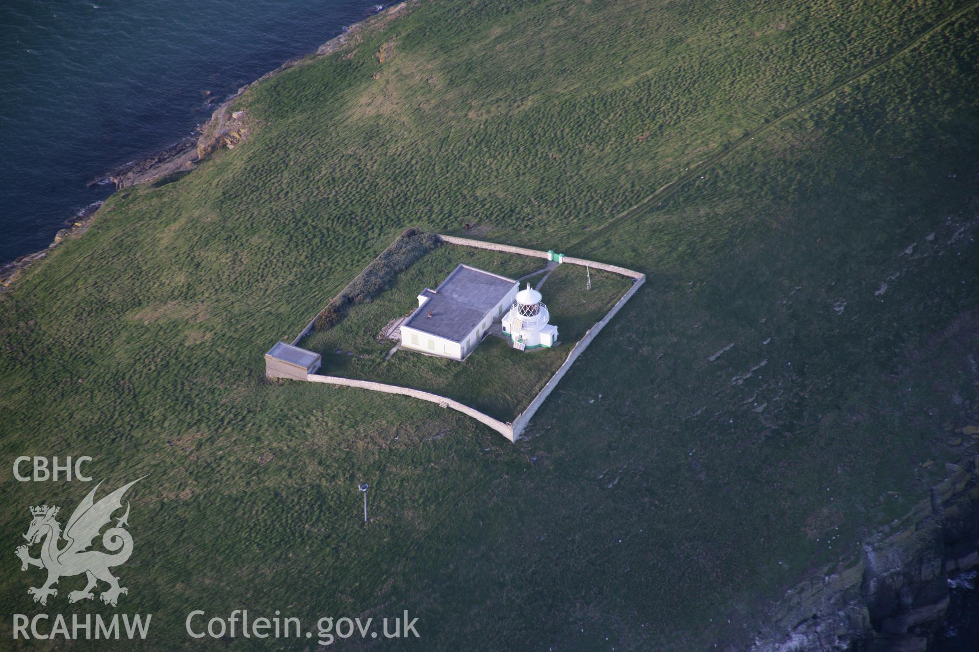 RCAHMW colour oblique aerial photograph of St Tudwall's Lighthouse from the south-east. Taken on 09 February 2006 by Toby Driver.