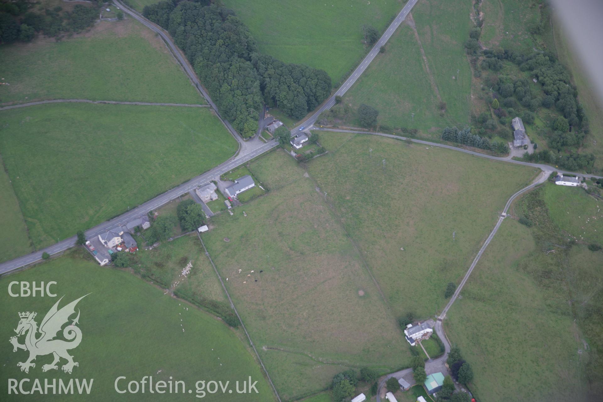 RCAHMW colour oblique aerial photograph of Rhos Hill Settlement Enclosure. Taken on 14 August 2006 by Toby Driver.