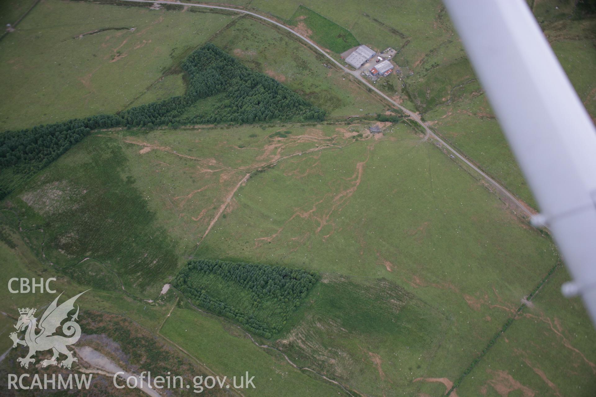 RCAHMW colour oblique aerial photograph of Llys Arthur enclosure. Taken on 27 July 2006 by Toby Driver.