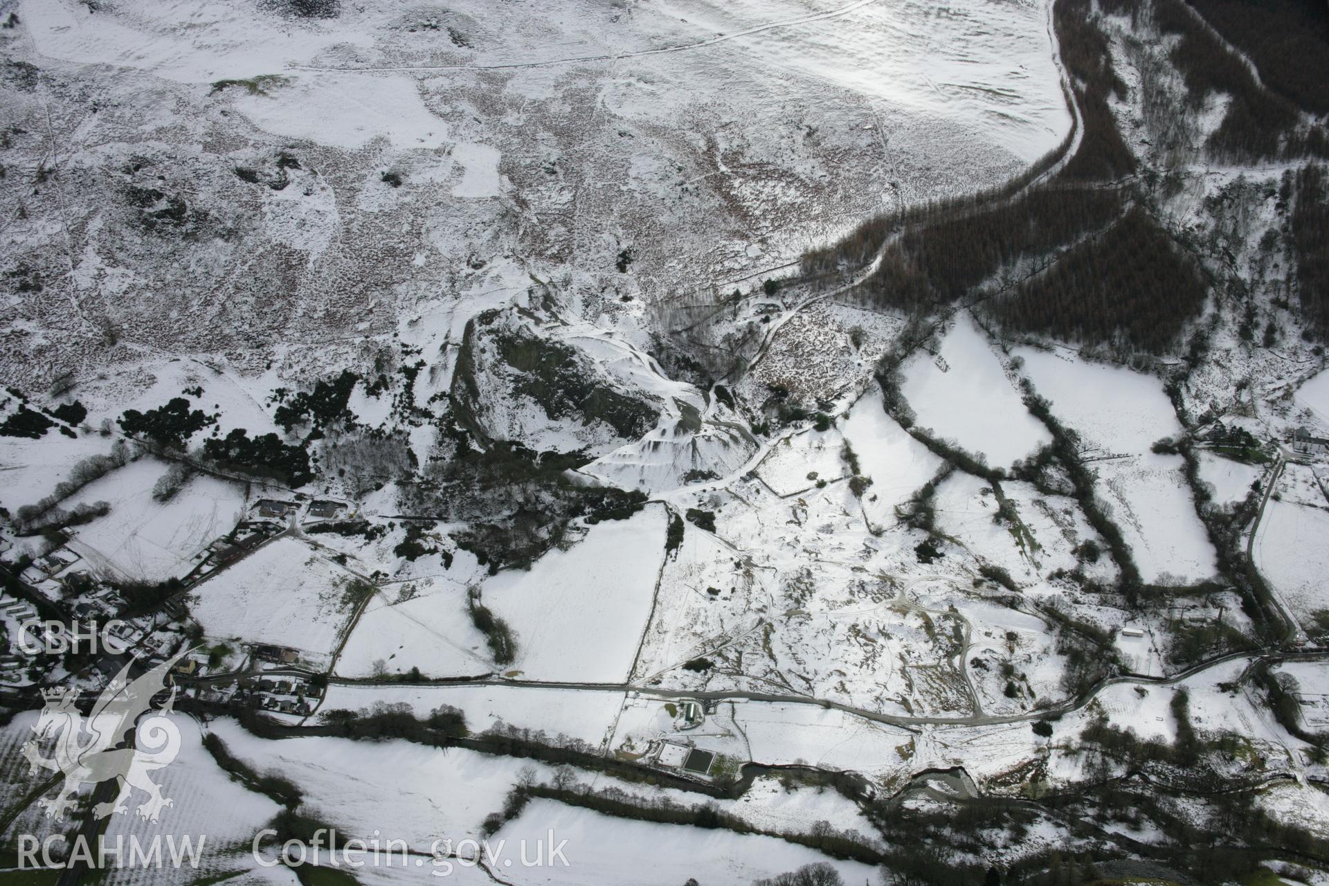 RCAHMW colour oblique aerial photograph of South Llangynog Lead Mine. A view from the north under snow. Taken on 06 March 2006 by Toby Driver.